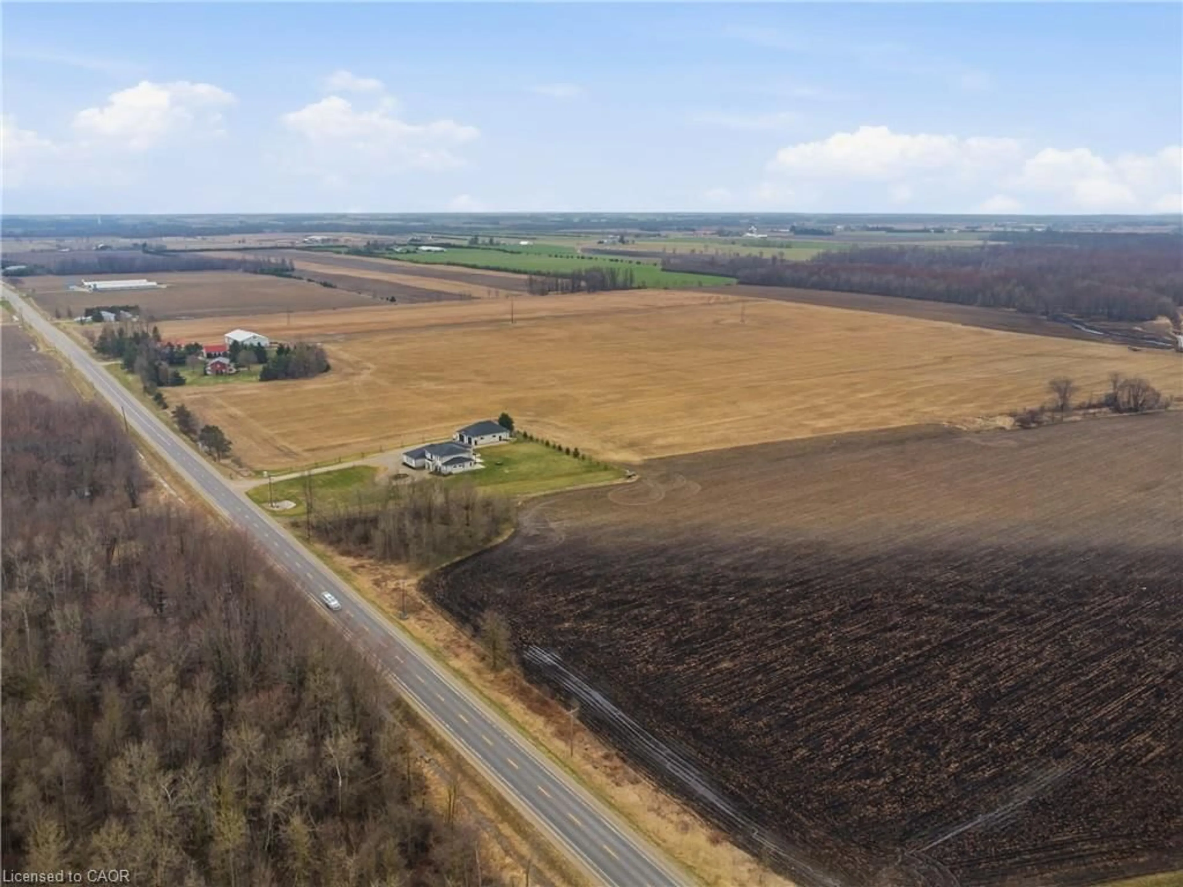 A pic from outside/outdoor area/front of a property/back of a property/a pic from drone, building for 9 Wellington Road 9, Mapleton Ontario N0G 2T0