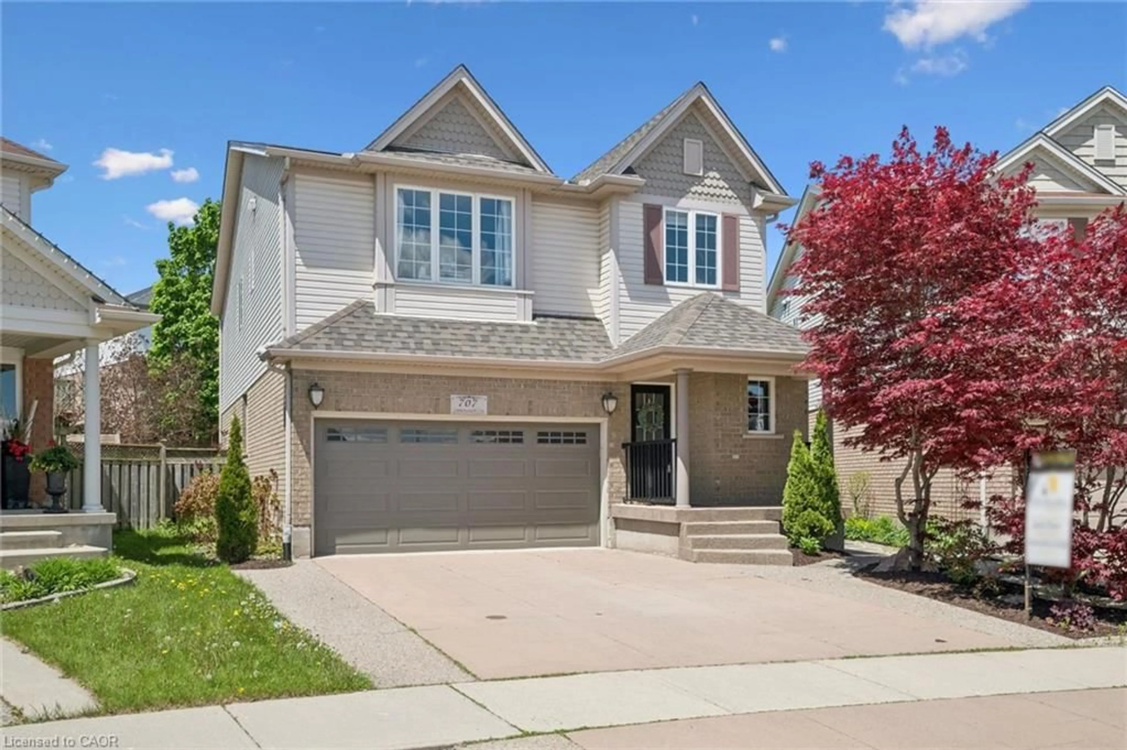 Home with brick exterior material, street for 707 Commonwealth Cres, Kitchener Ontario N2E 4J8