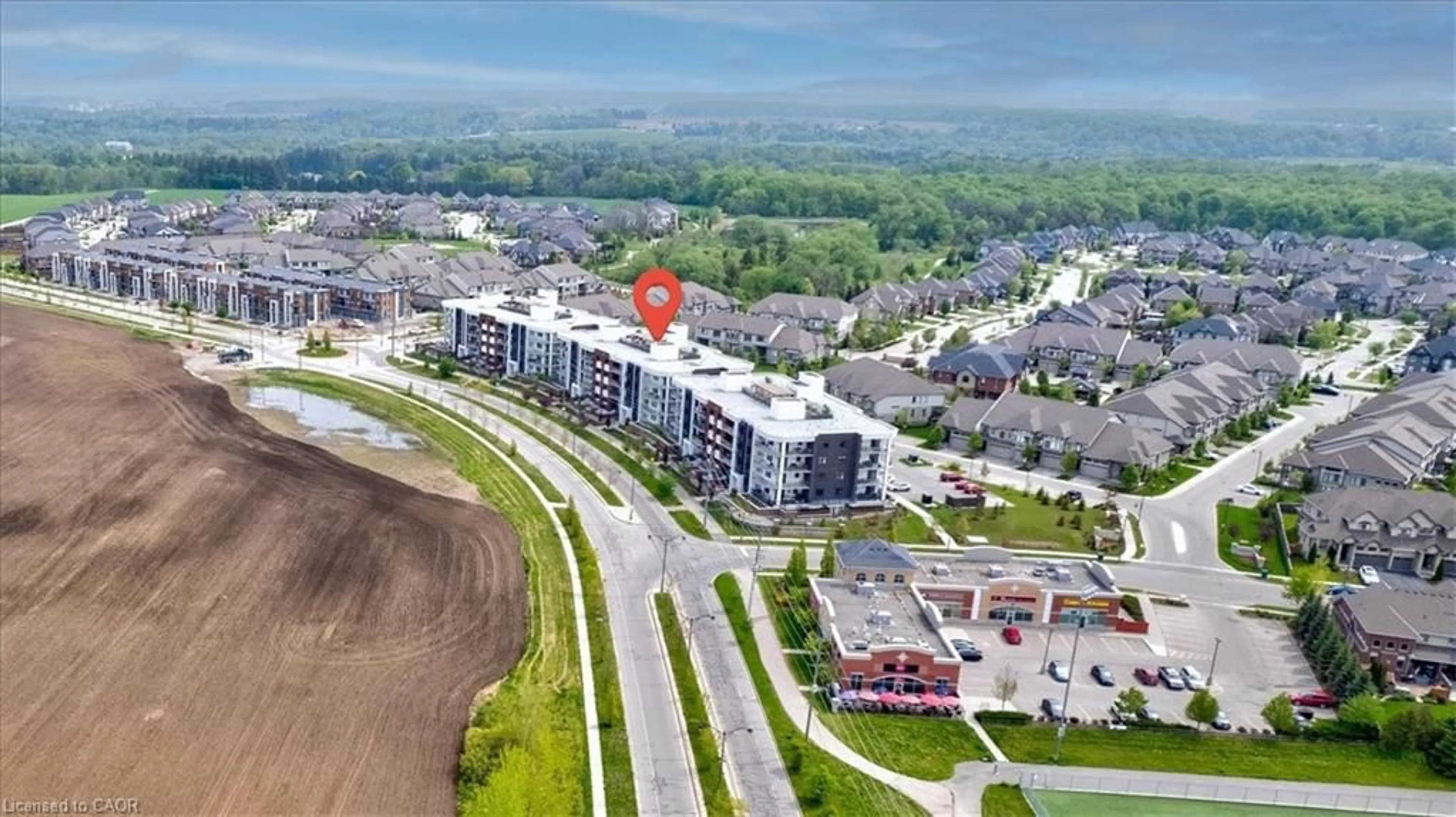 A pic from outside/outdoor area/front of a property/back of a property/a pic from drone, unknown for 247 Grey Silo Rd #307B, Waterloo Ontario N2K 0G7