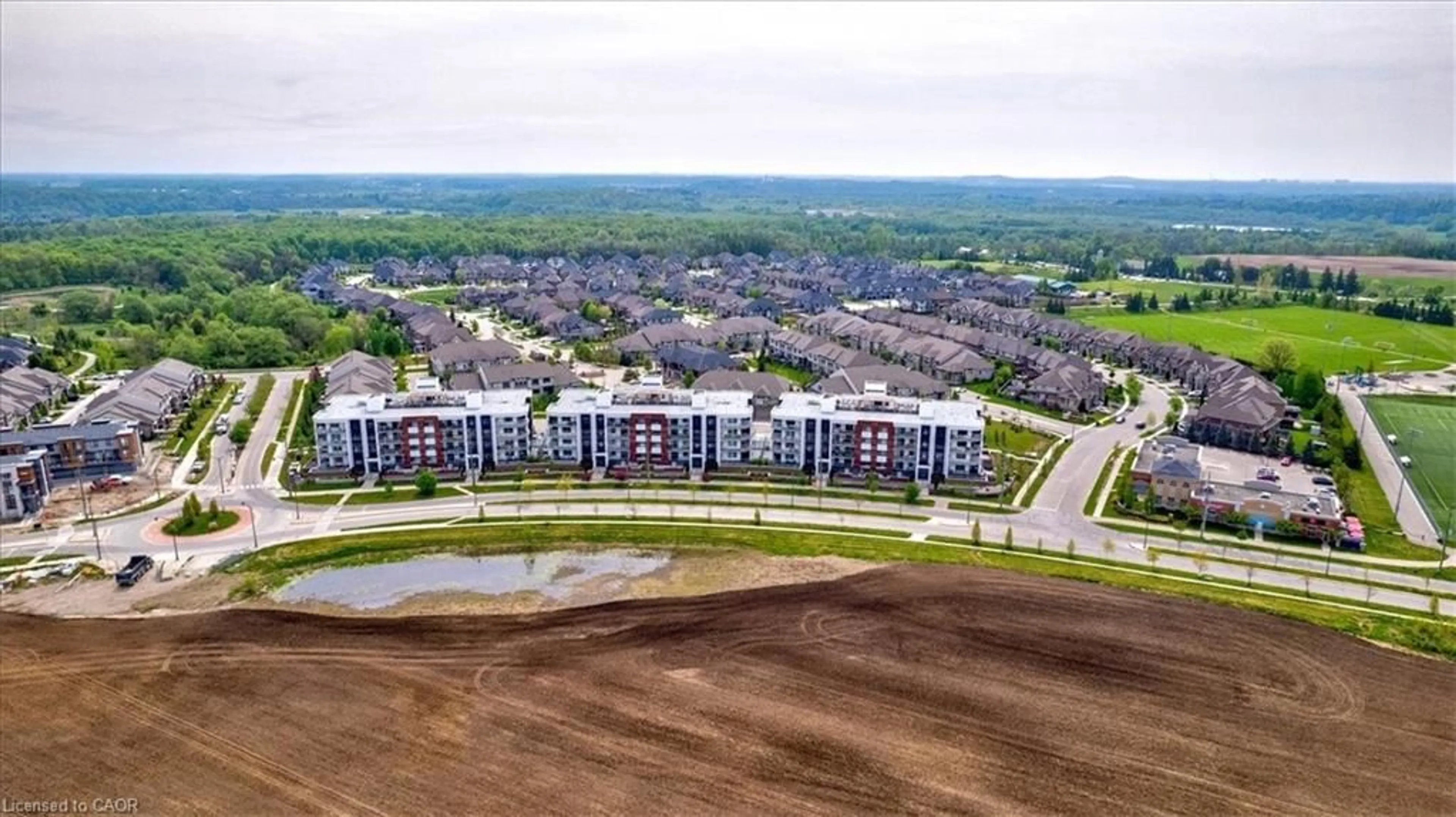 A pic from outside/outdoor area/front of a property/back of a property/a pic from drone, unknown for 247 Grey Silo Rd #307B, Waterloo Ontario N2K 0G7