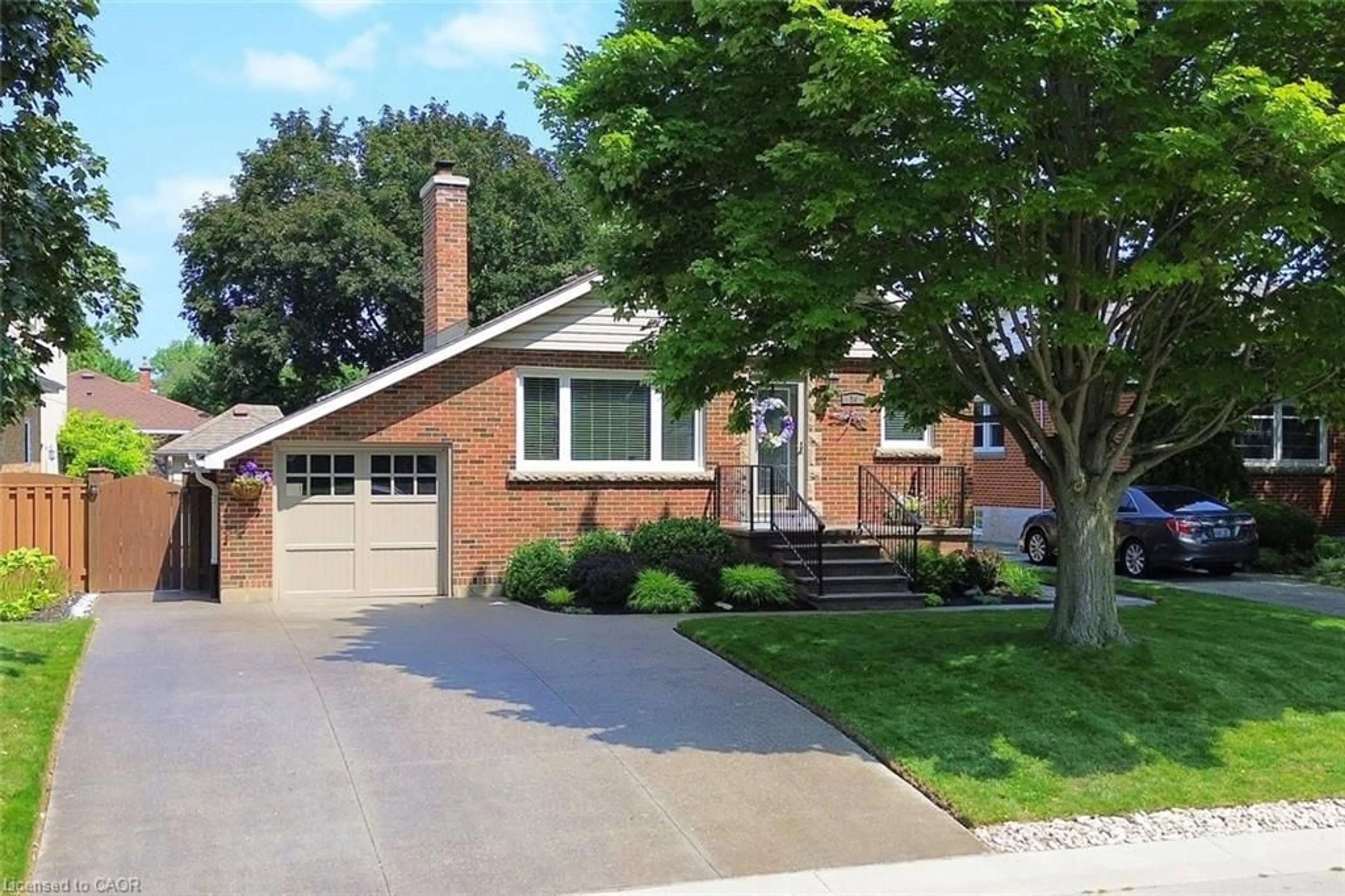 Home with brick exterior material, street for 16 Grant Blvd, Hamilton Ontario L9H 4L6