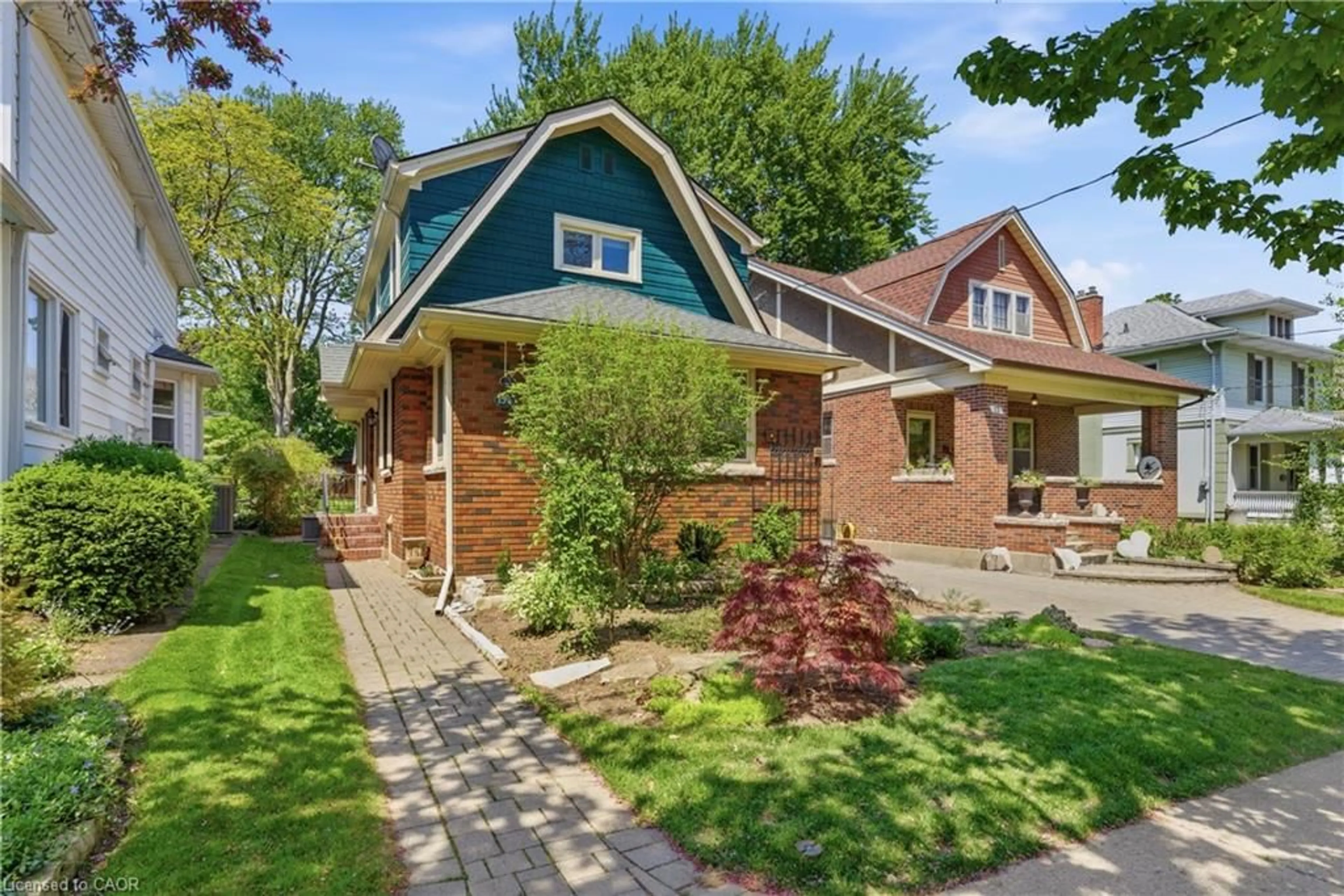 Home with brick exterior material, street for 15 1/2 Wolseley Ave, St. Catharines Ontario L2R 4T4