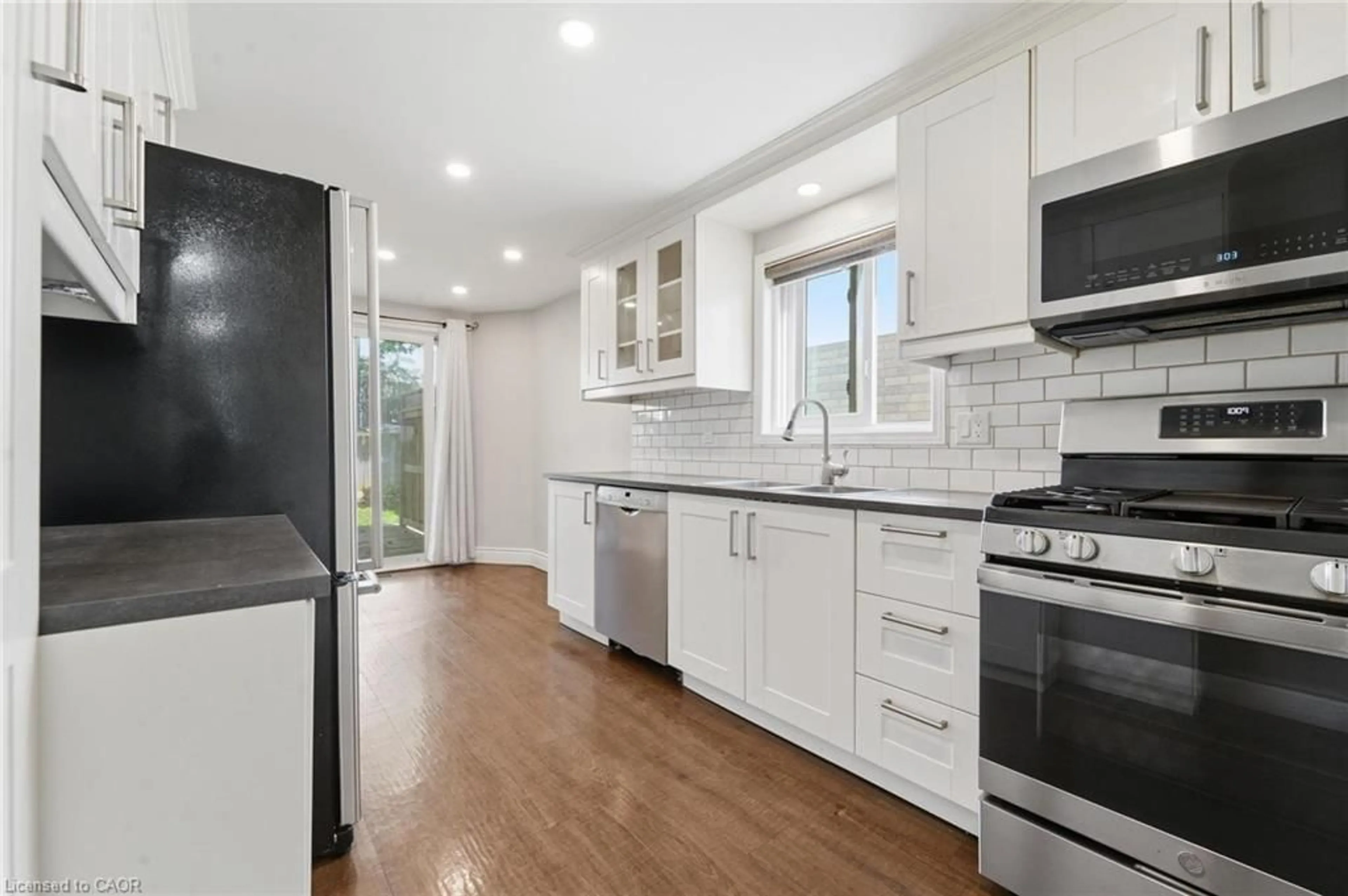 Open concept kitchen, ceramic/tile floor for 449 Exmoor St, Waterloo Ontario N2K 3T7