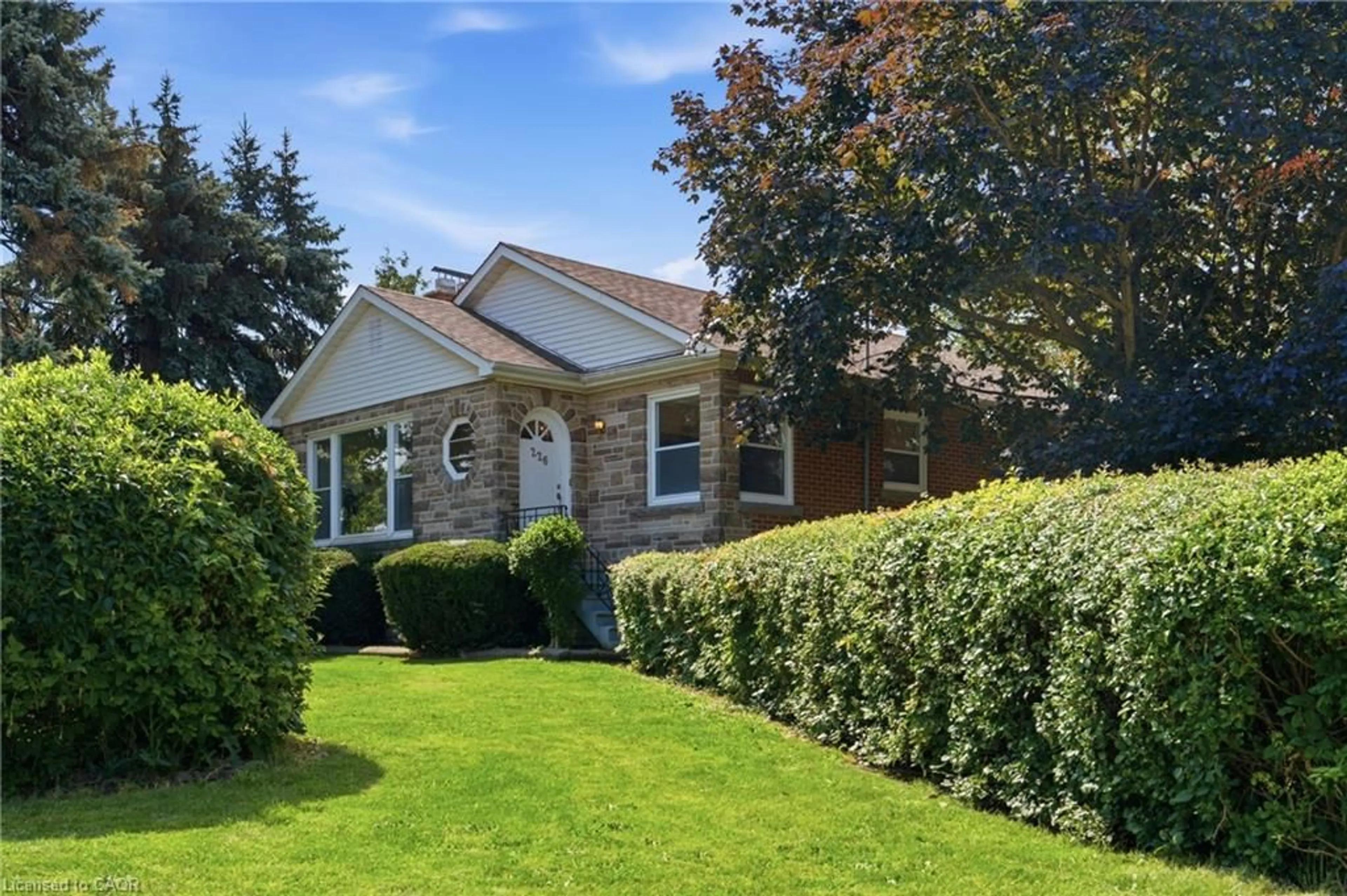 Home with brick exterior material, street for 226 Highway 8 Ave, Stoney Creek Ontario L8G 1C9