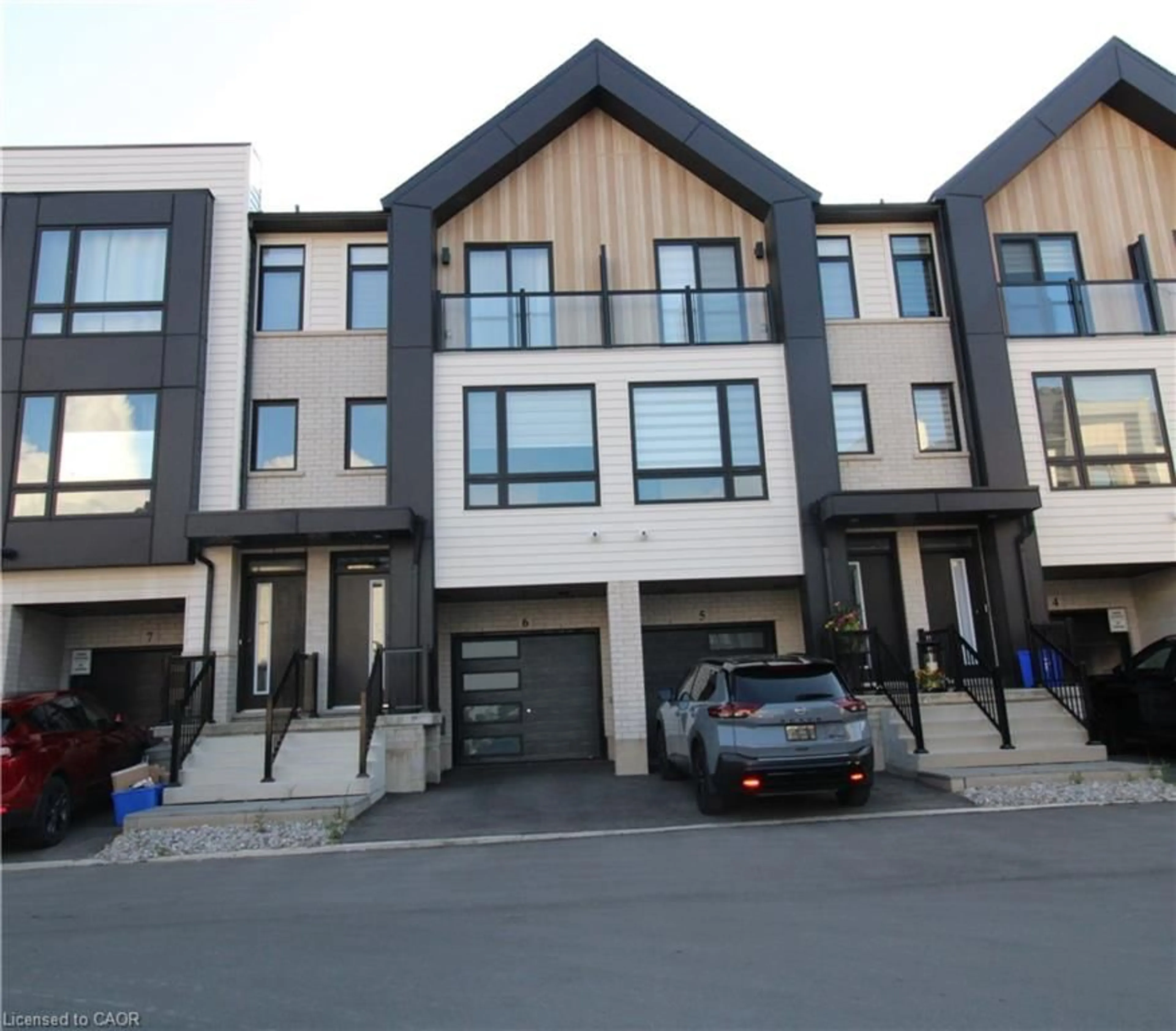 A pic from outside/outdoor area/front of a property/back of a property/a pic from drone, street for 55 Tom Brown Dr #6, Paris Ontario N3L 0N5