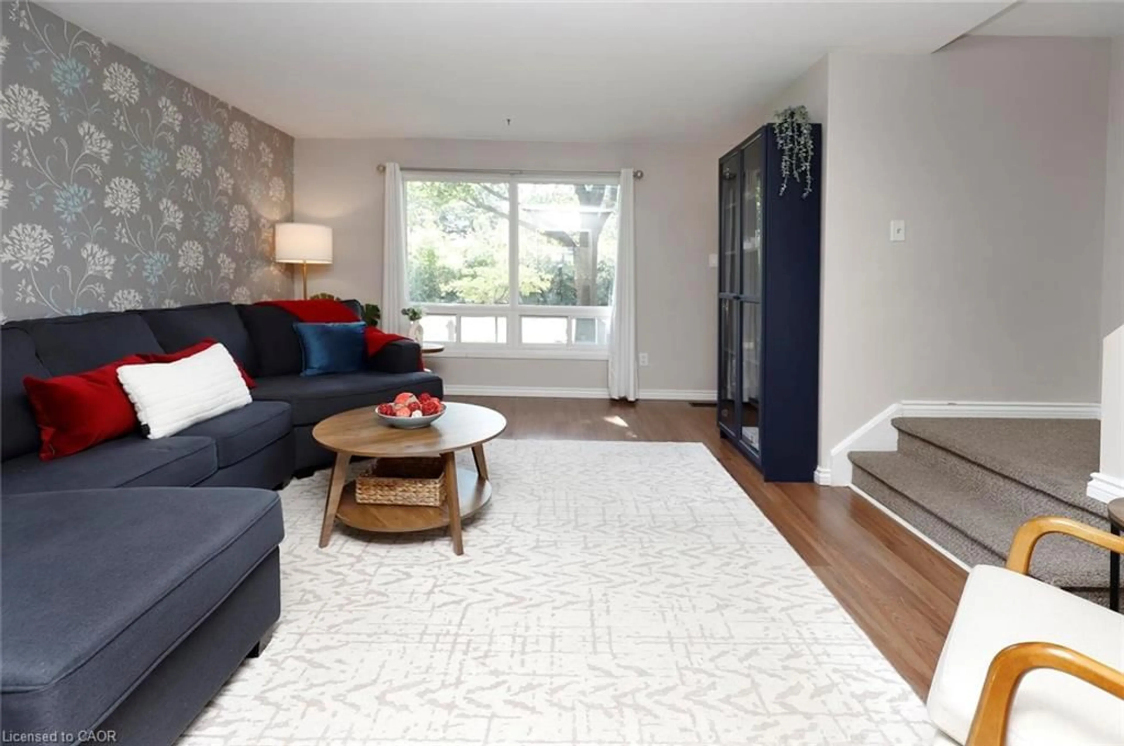 Living room with furniture, unknown for 211 Lake Ave, Hamilton Ontario L8E 1L5