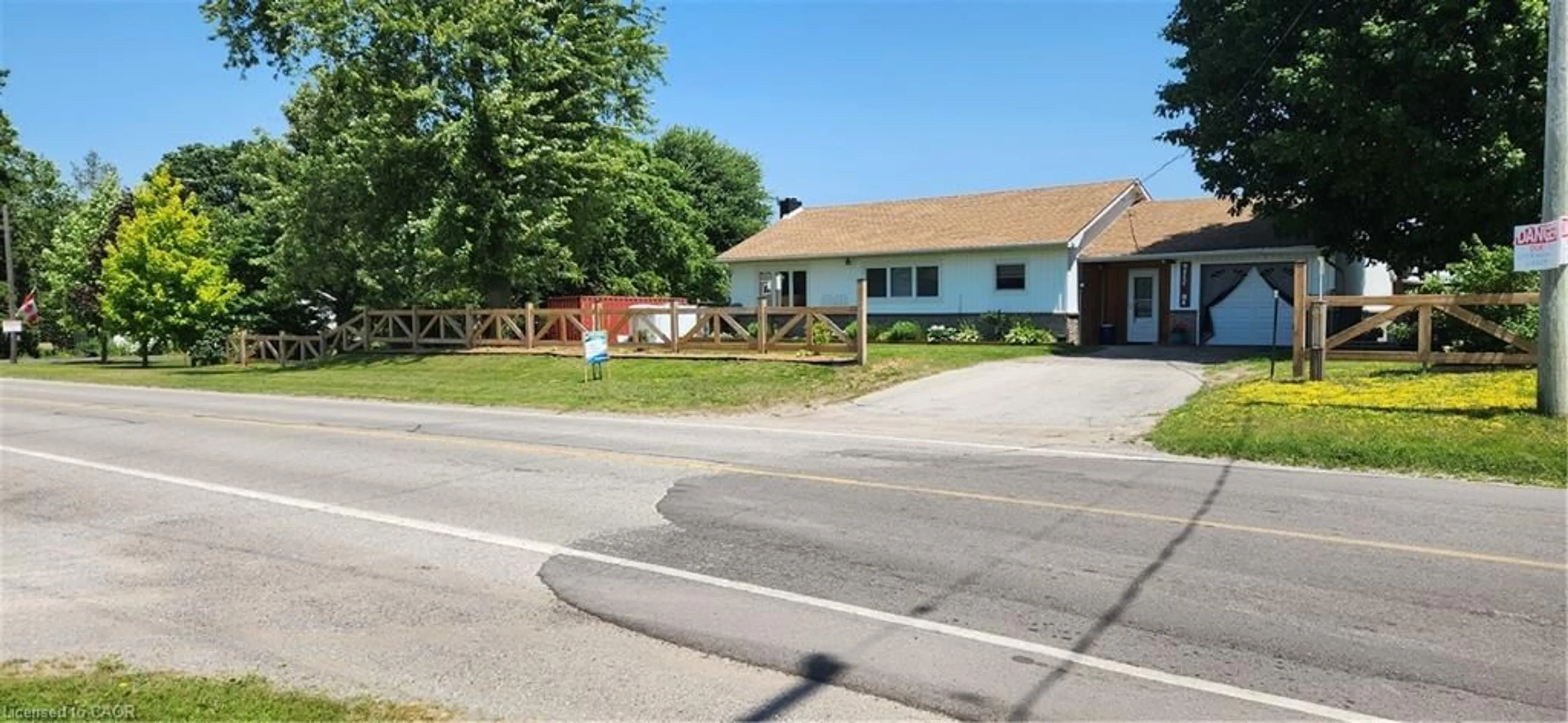 A pic from outside/outdoor area/front of a property/back of a property/a pic from drone, street for 700 Norfolk County Rd 28, Langton Ontario N0E 1G0
