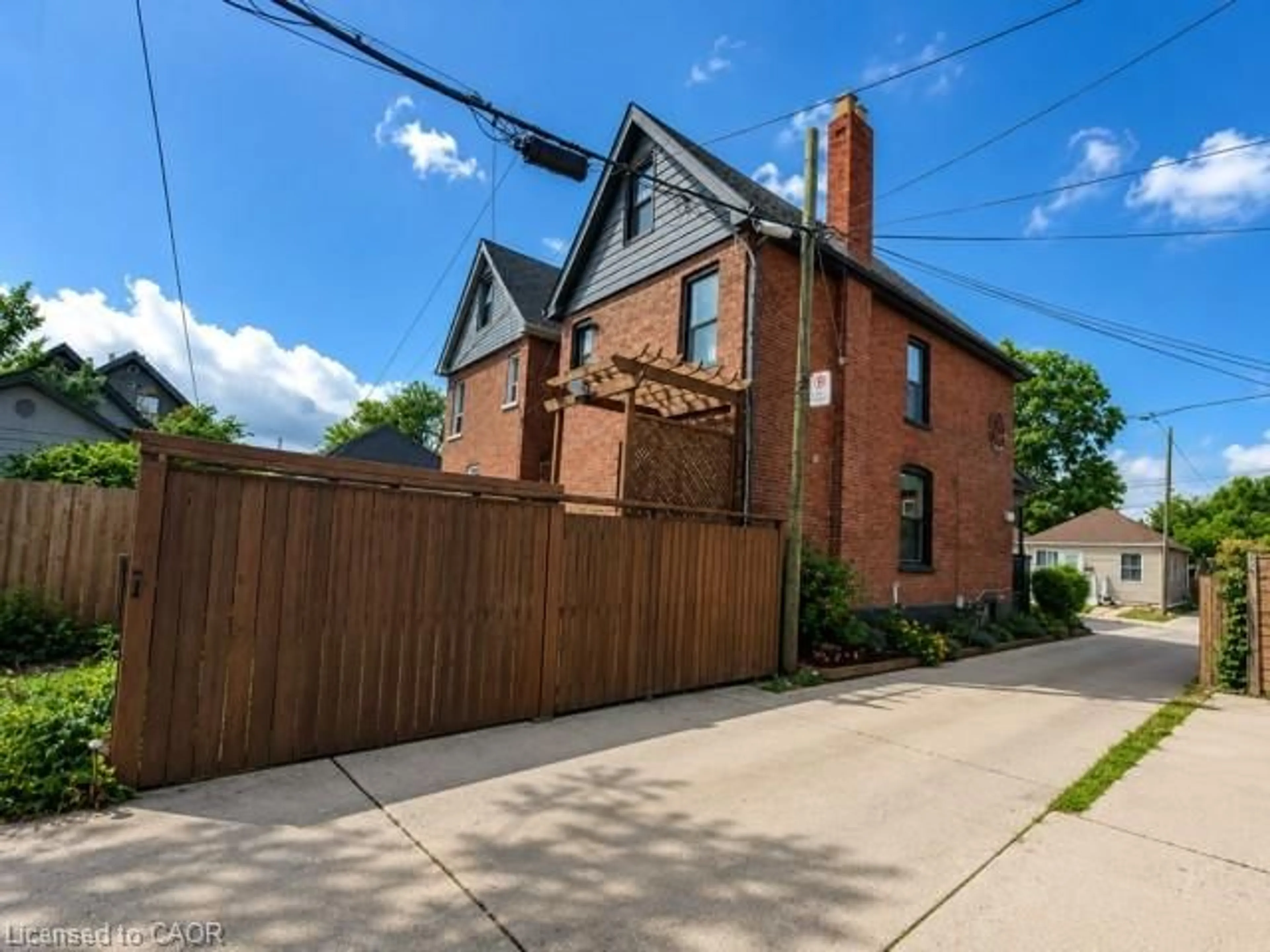 Home with brick exterior material, street for 26 Campbell Ave, Hamilton Ontario L8L 2N1