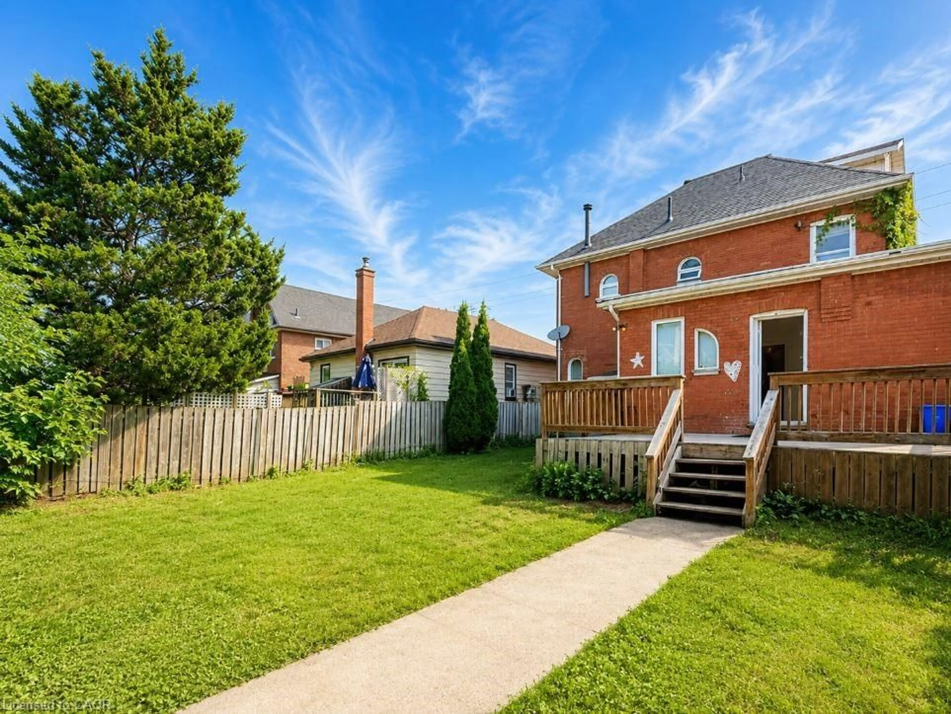 Home with brick exterior material, street for 219 Erie Ave, Brantford Ontario N3S 2H1