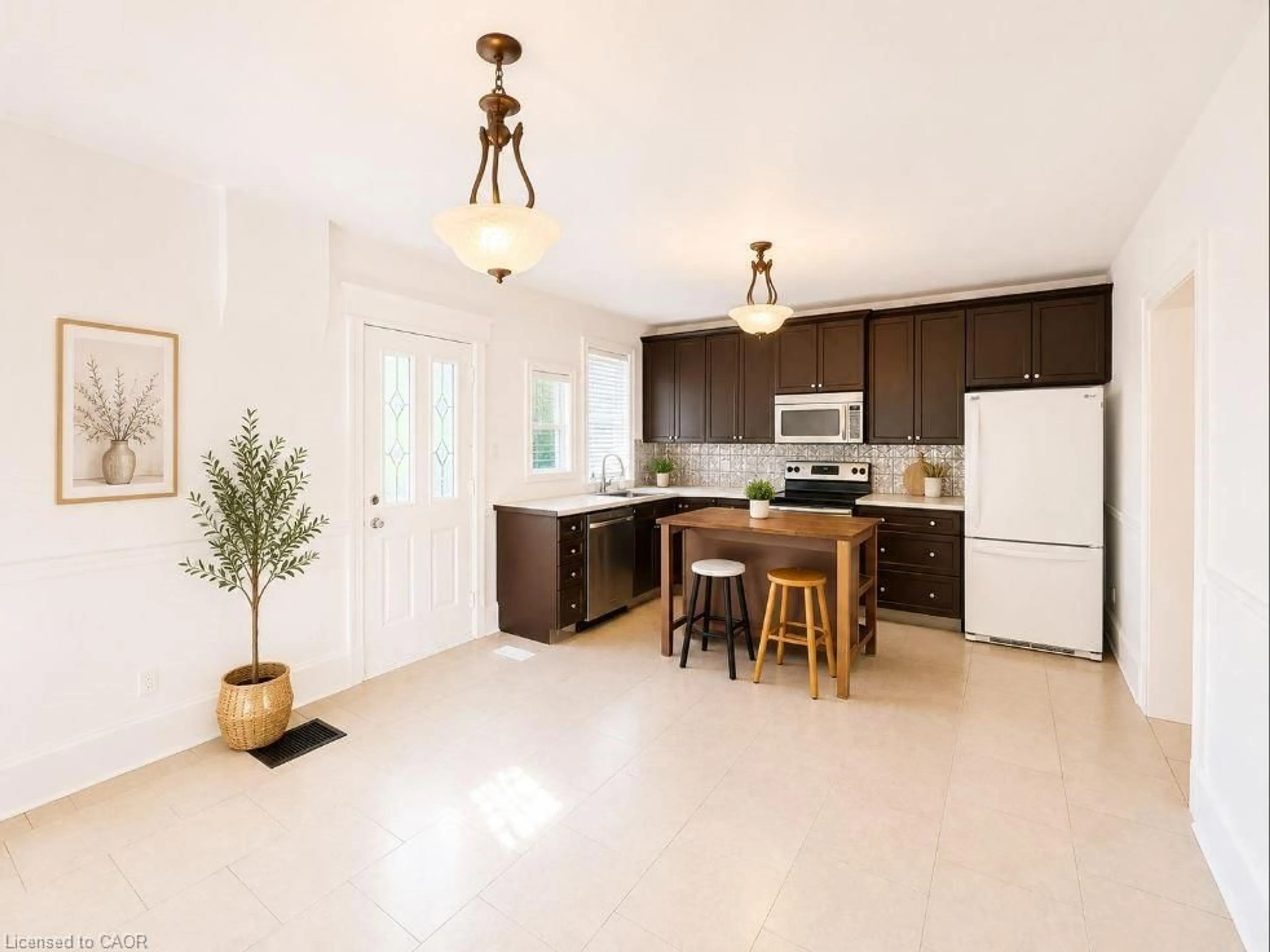 Open concept kitchen, ceramic/tile floor for 219 Erie Ave, Brantford Ontario N3S 2H1