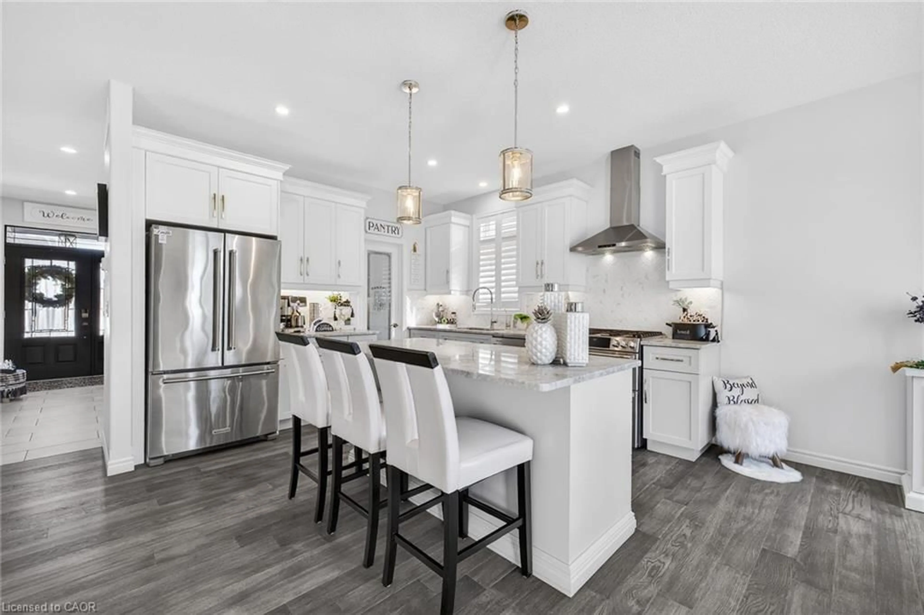 Open concept kitchen, wood/laminate floor for 35 Lock St, Innerkip Ontario N0J 1M0