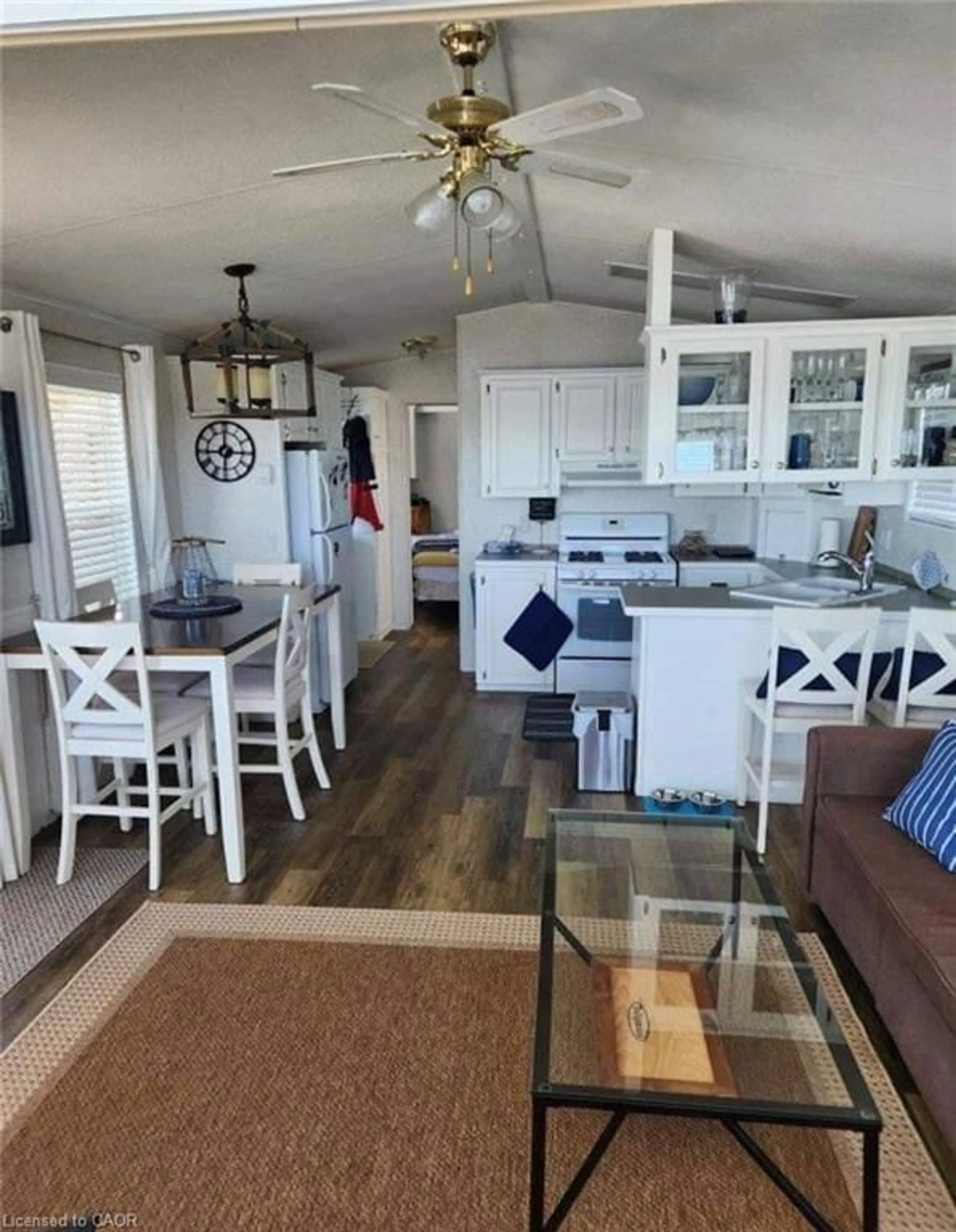 Open concept kitchen, wood/laminate floor for 70 Bluewater Ave #91, St. Williams Ontario N0E 1P0