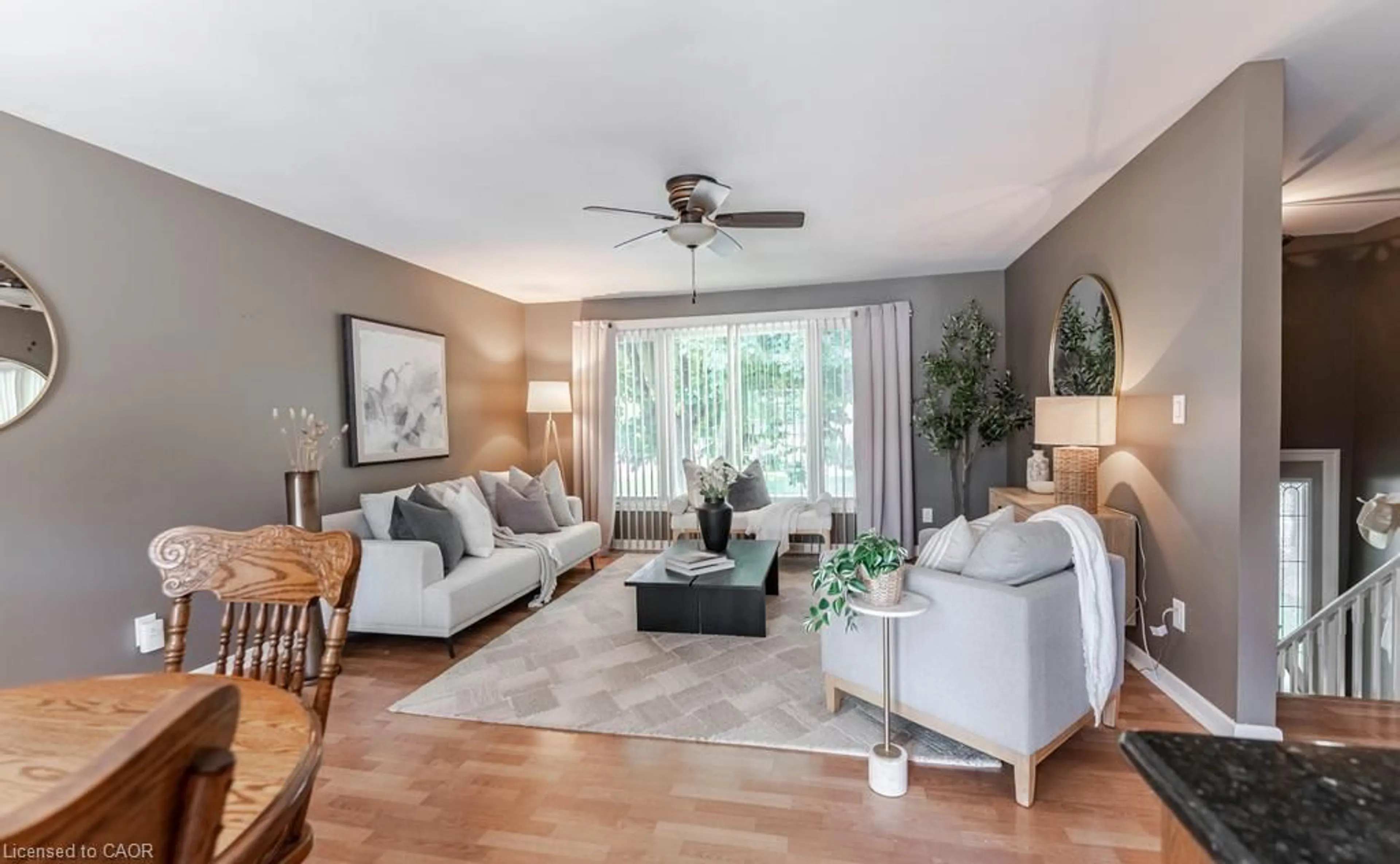 Living room with furniture, wood/laminate floor for 42 Jane St, Hagersville Ontario N0A 1H0