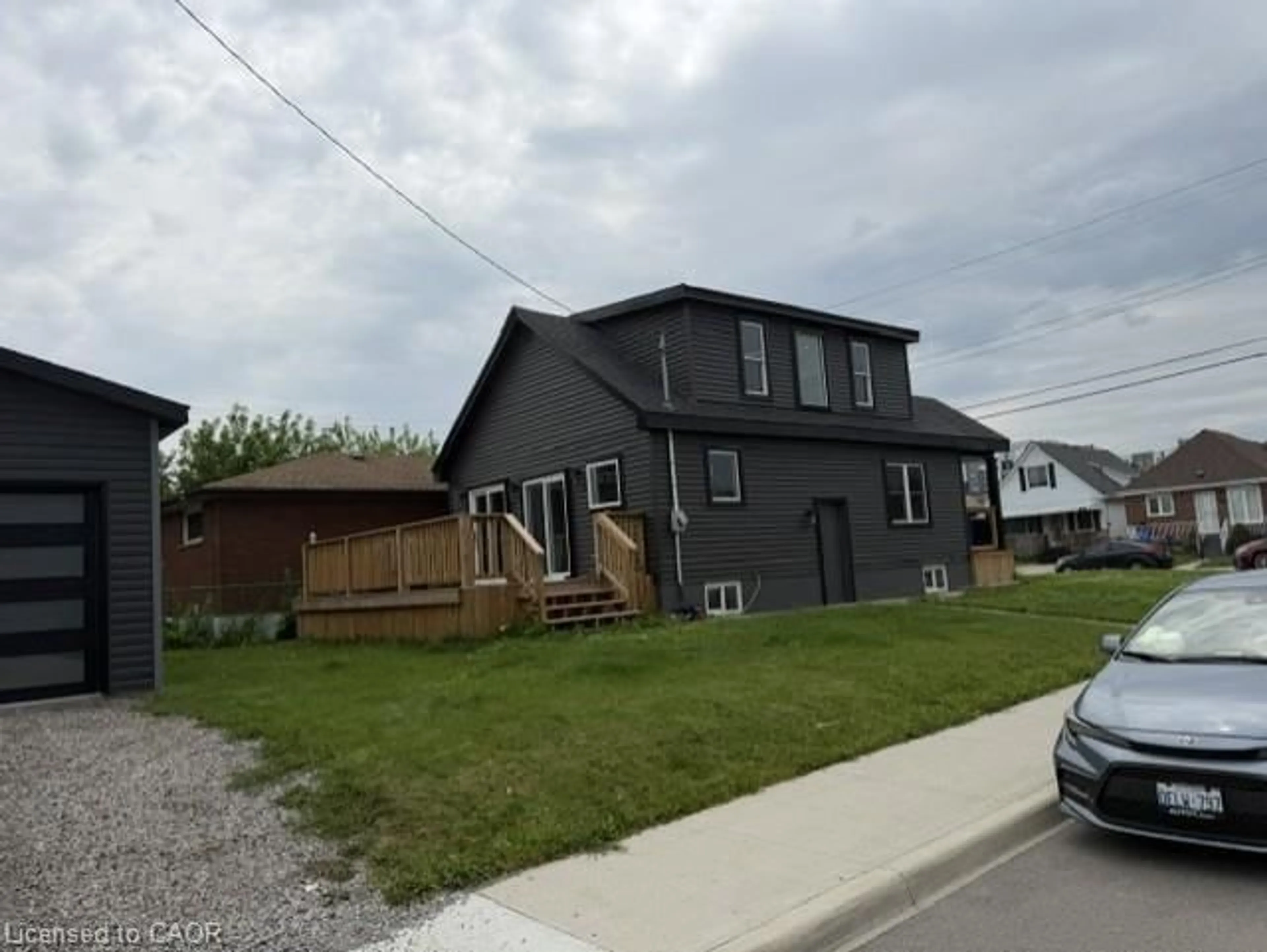 Home with vinyl exterior material, street for 1239 Dunsmure Rd, Hamilton Ontario L8H 1L7