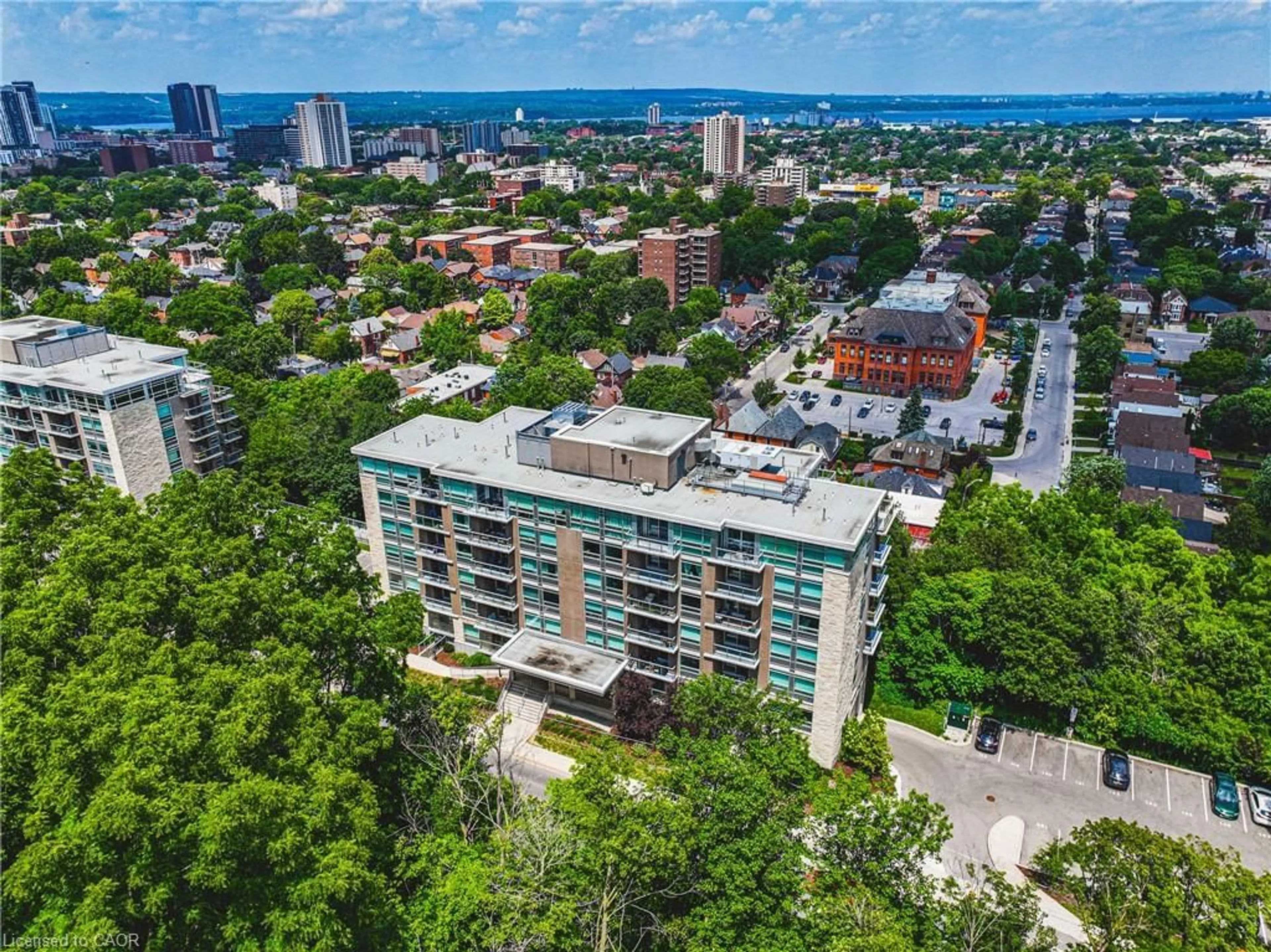 A pic from outside/outdoor area/front of a property/back of a property/a pic from drone, city buildings view from balcony for 479 Charlton Ave #105, Hamilton Ontario L8N 0B4