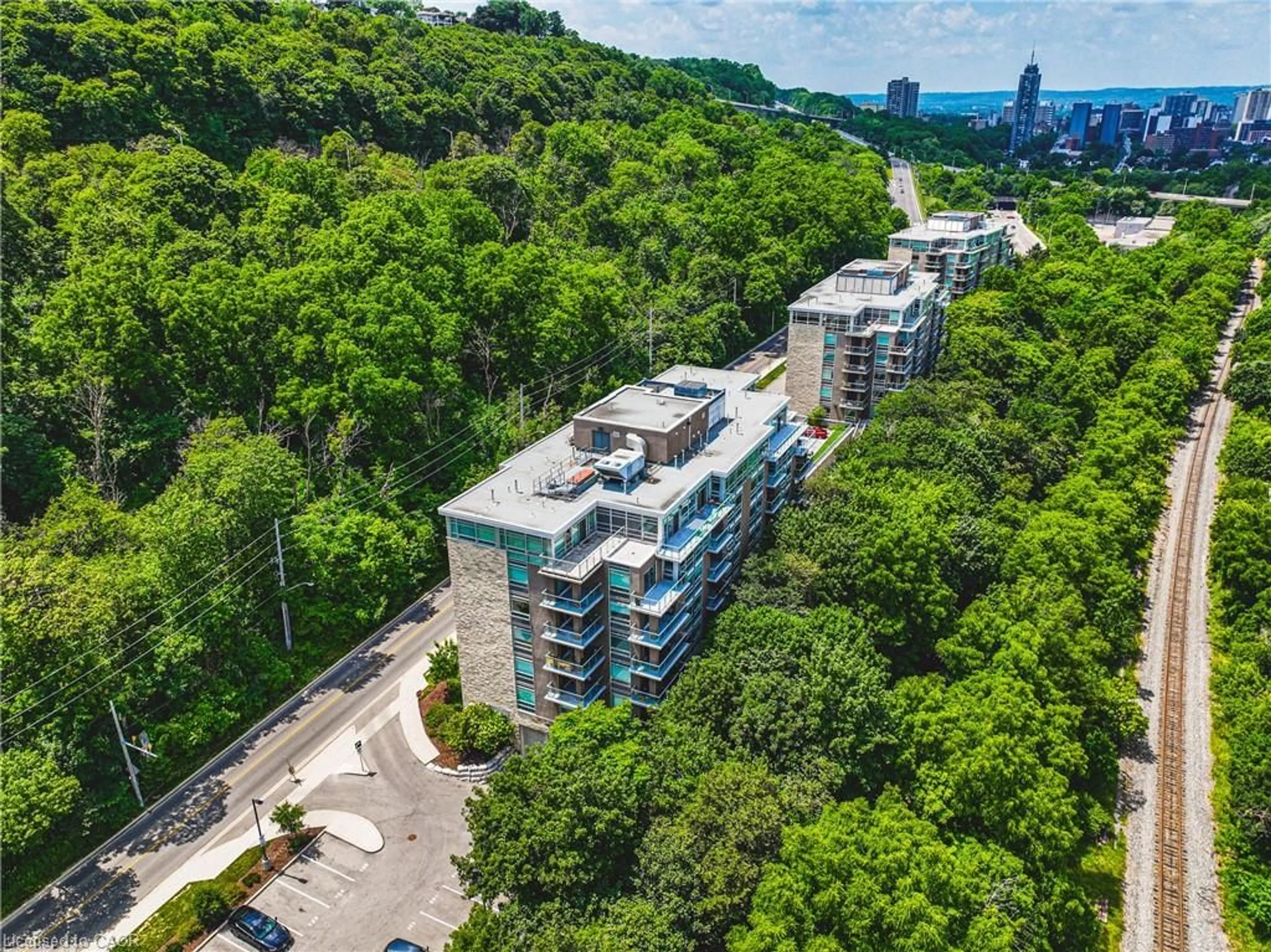 A pic from outside/outdoor area/front of a property/back of a property/a pic from drone, unknown for 479 Charlton Ave #105, Hamilton Ontario L8N 0B4