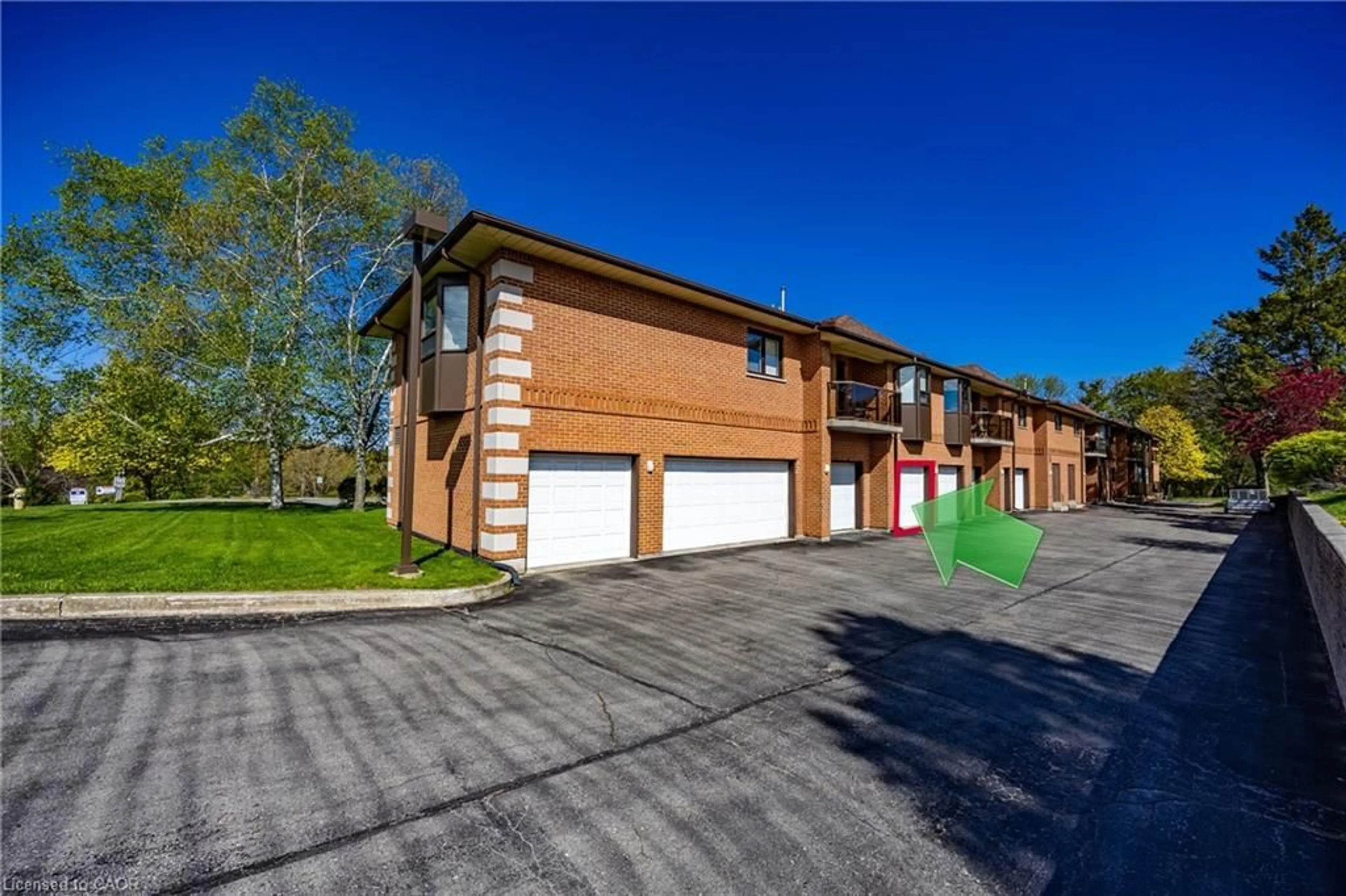 A pic from outside/outdoor area/front of a property/back of a property/a pic from drone, street for 303 William St #205, Delhi Ontario N4B 1N1