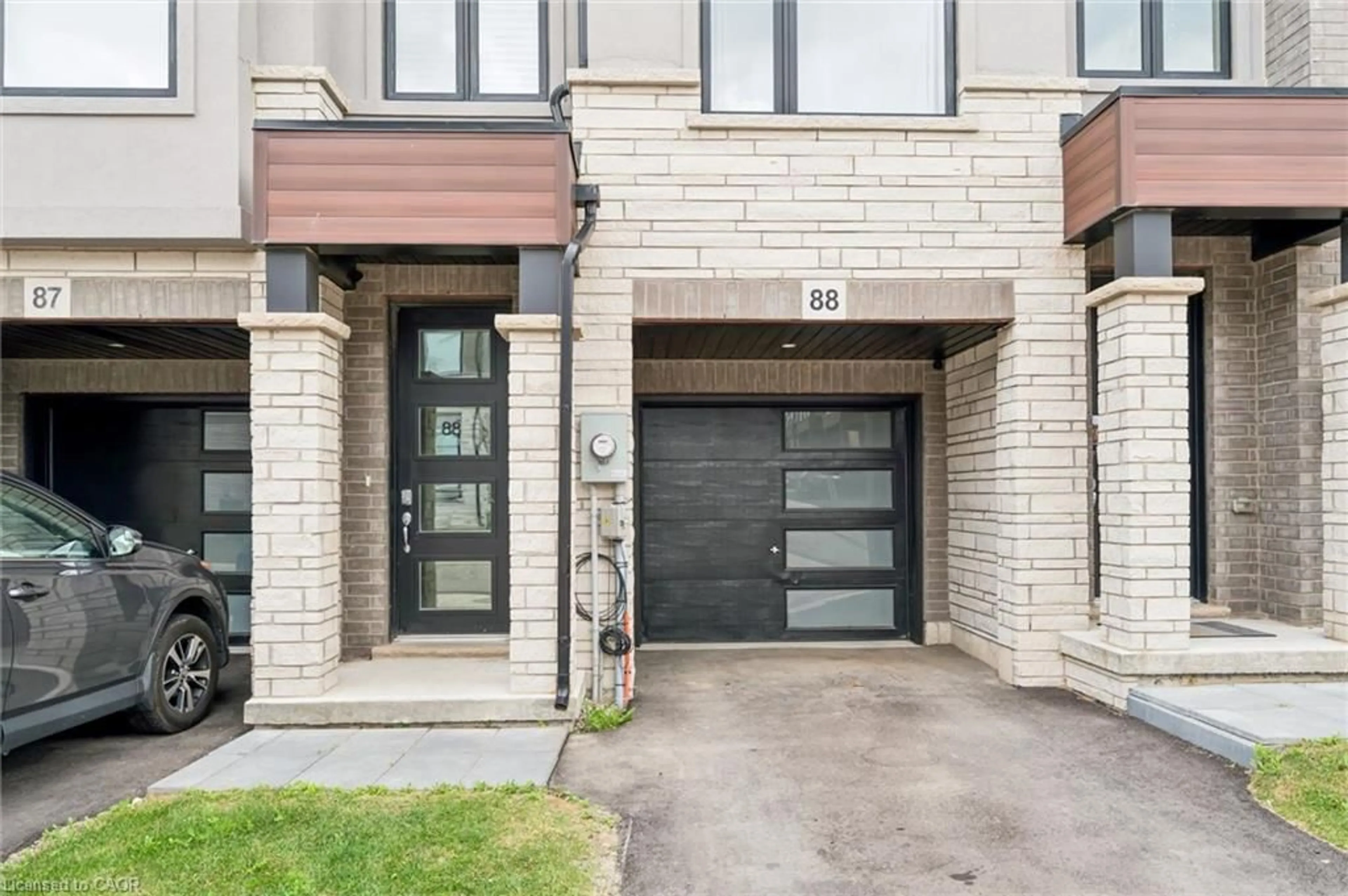 Home with brick exterior material, street for 155 Equestrian Way #88, Cambridge Ontario N3E 0E8