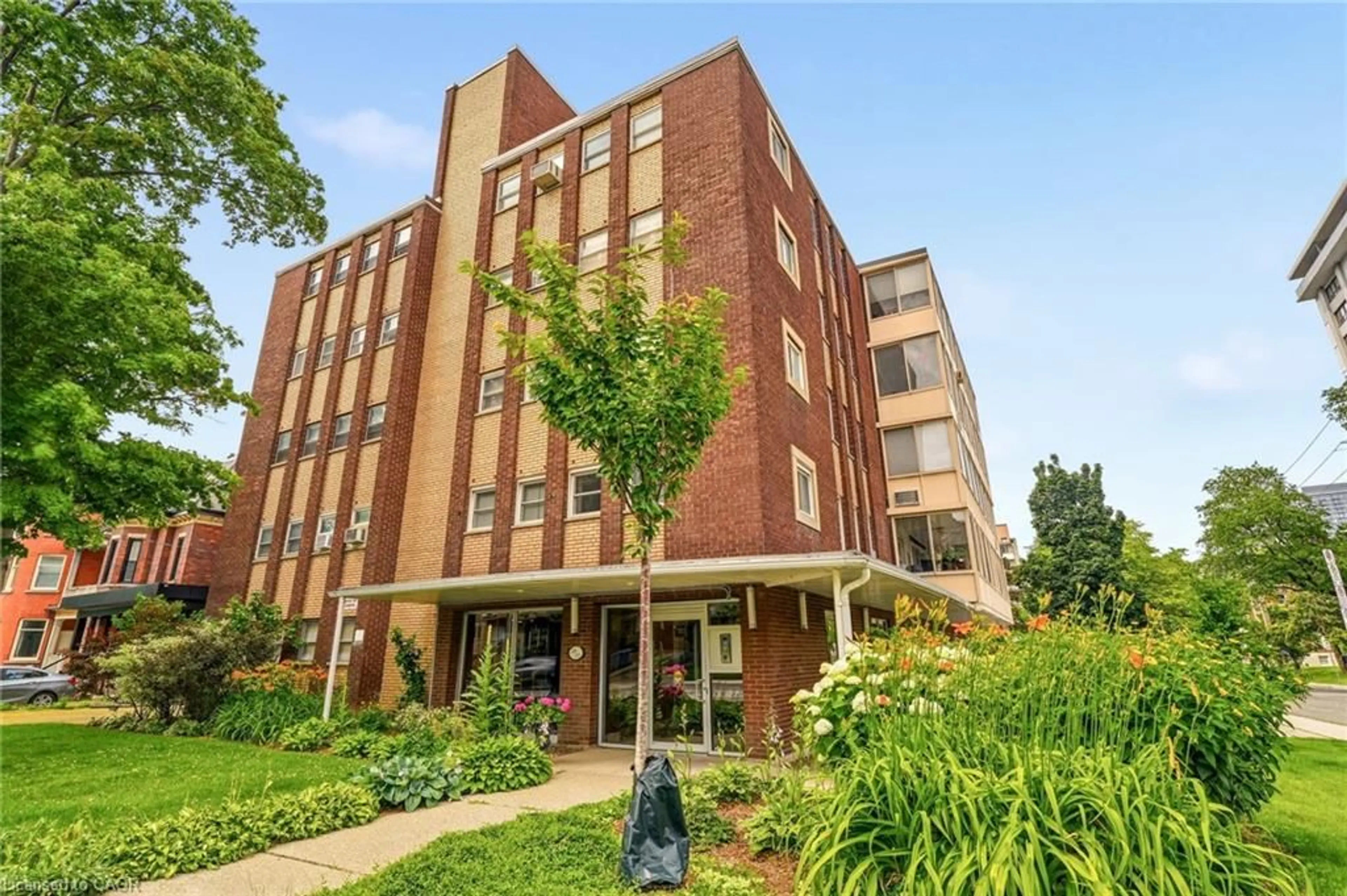 Home with brick exterior material, building for 38 Charlton Ave #402, Hamilton Ontario L8P 2C1