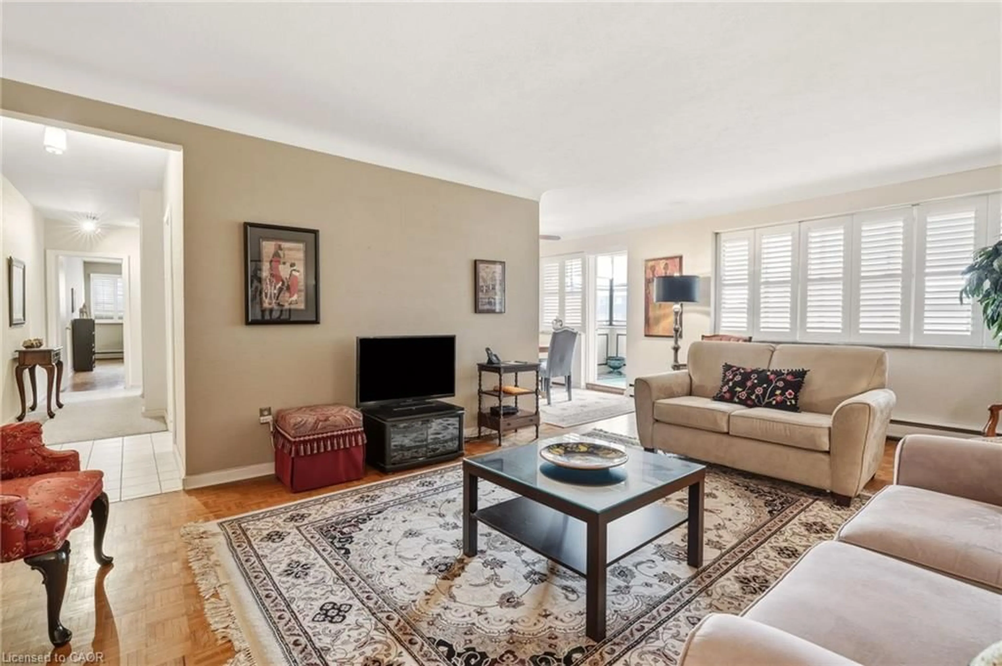 Living room with furniture, unknown for 38 Charlton Ave #402, Hamilton Ontario L8P 2C1
