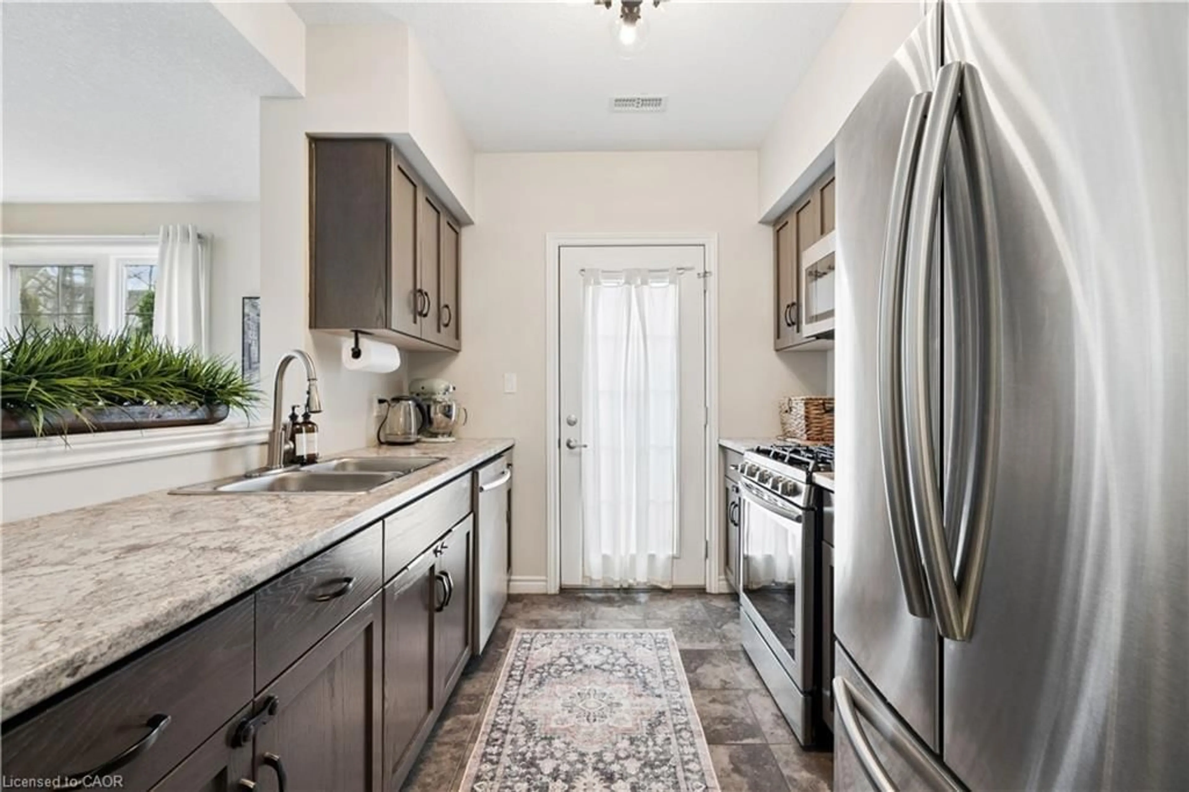 Open concept kitchen, ceramic/tile floor for 9 Guthrie Lane #9B, Rockwood Ontario N0B 2K0