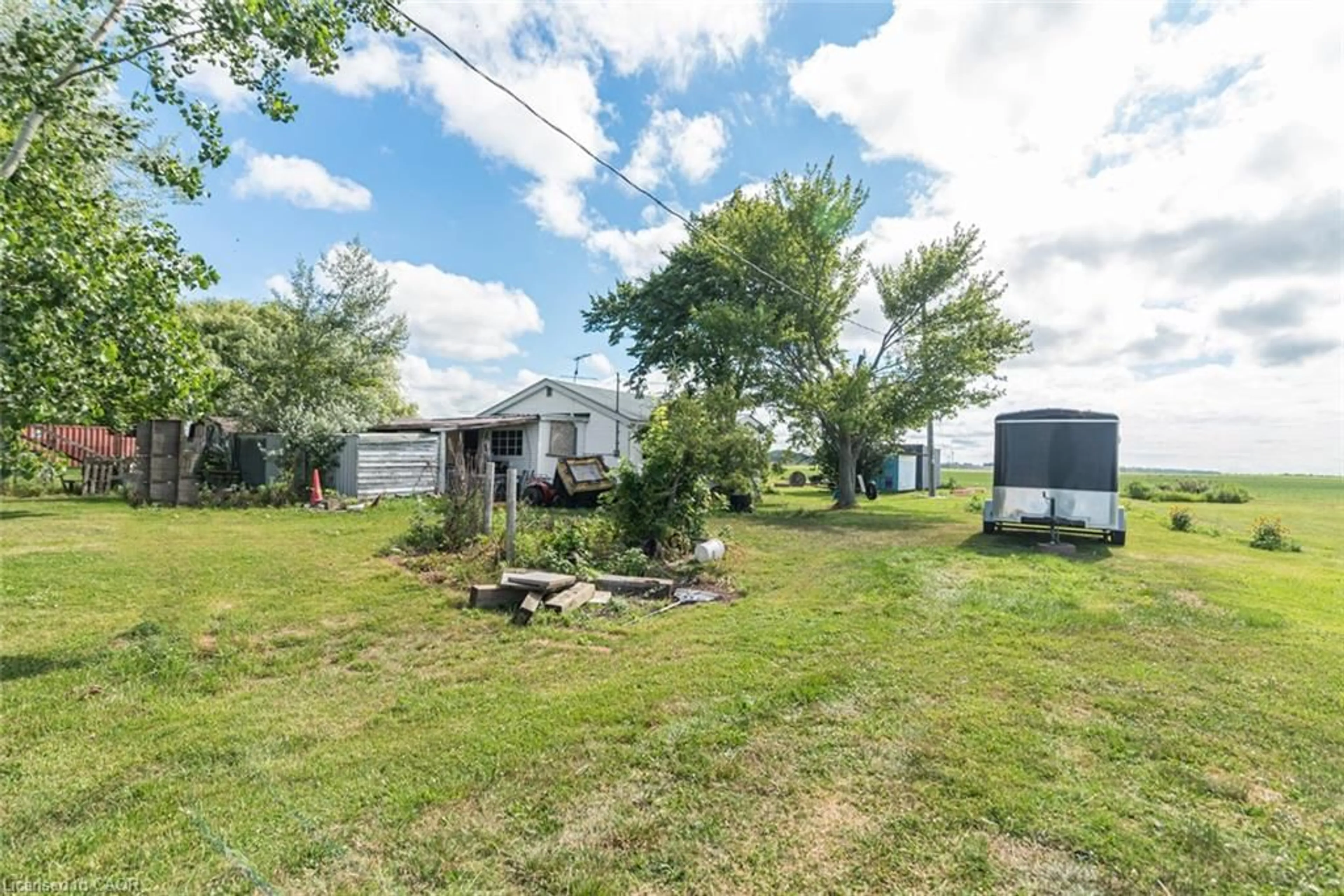 A pic from outside/outdoor area/front of a property/back of a property/a pic from drone, water/lake/river/ocean view for 52 Windy Line, Lowbanks Ontario N0A 1K0