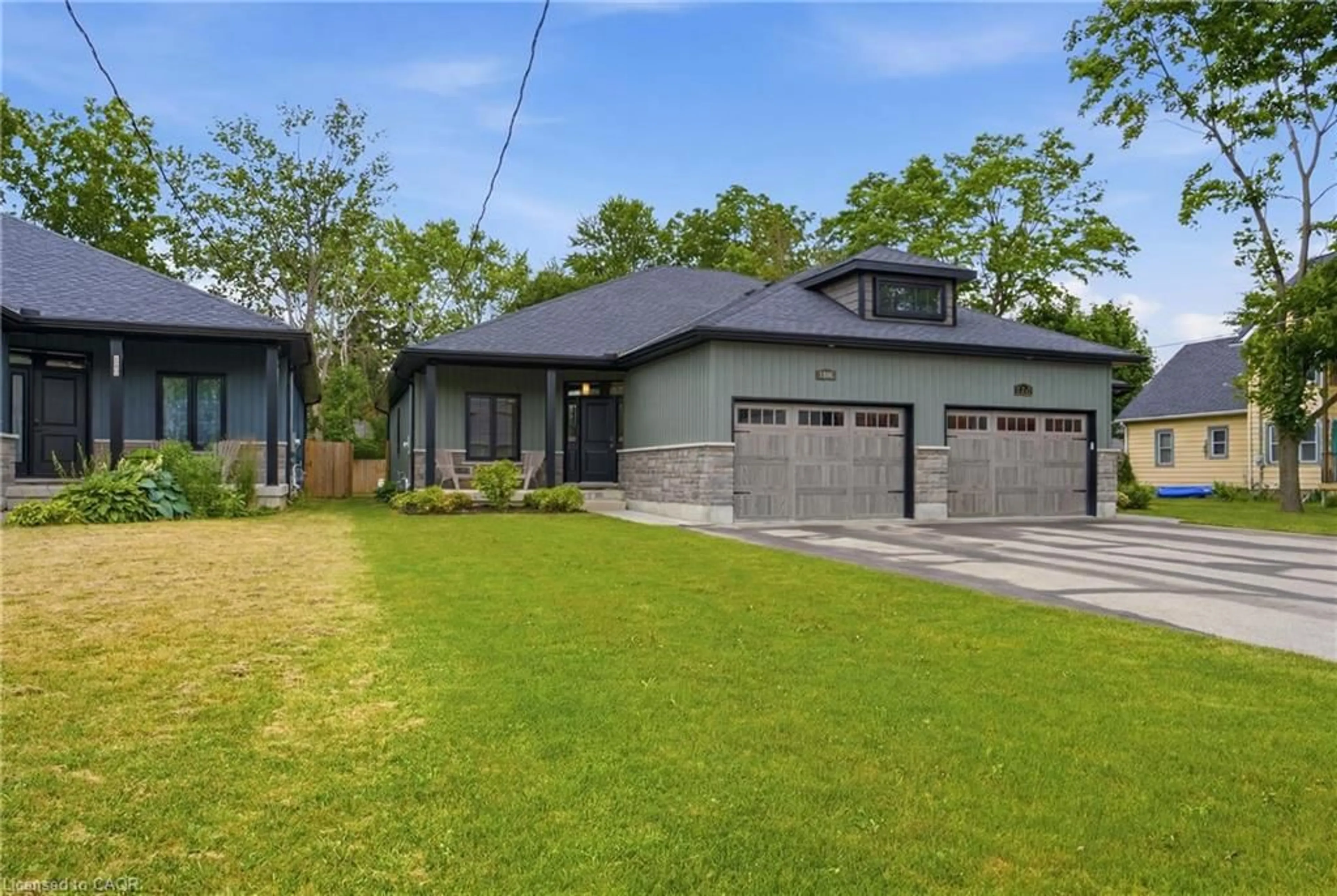 Home with brick exterior material, street for 1055 Bay St, Port Rowan Ontario N0E 1M0