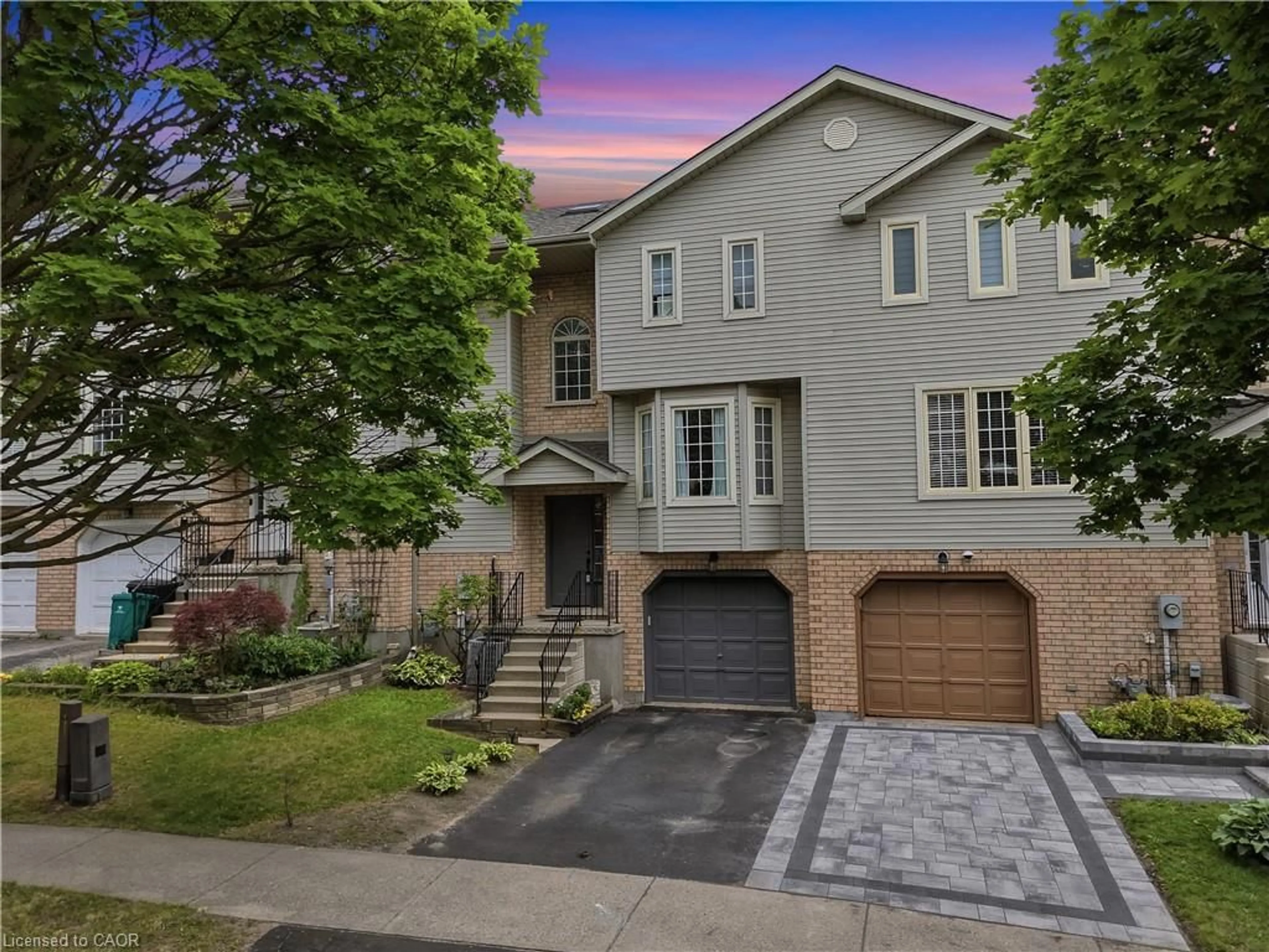 Home with brick exterior material, street for 692 Grange Cres, Waterloo Ontario N2T 2L8