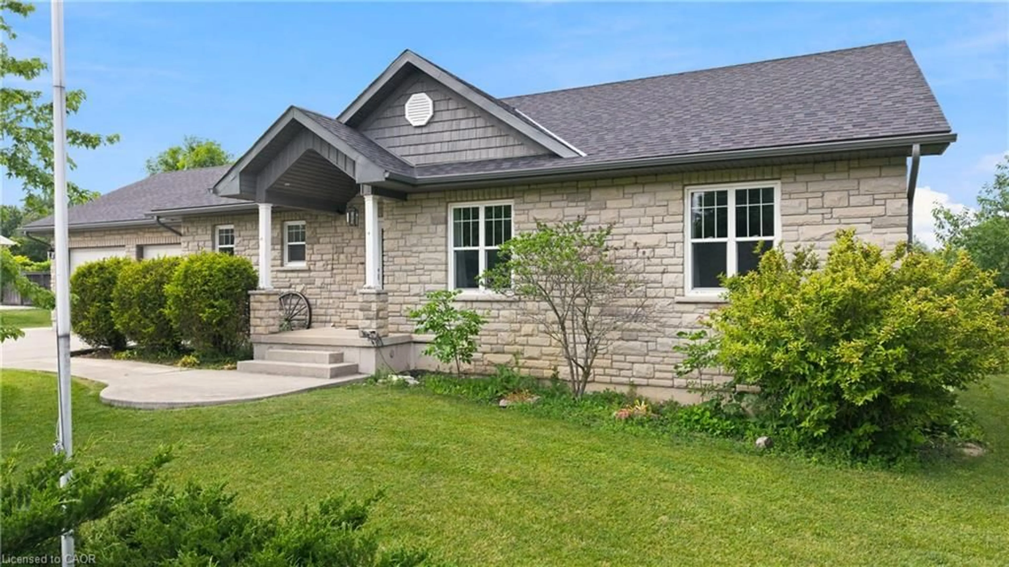 Home with brick exterior material, street for 14 Regency Dr, Minto Ontario N0G 1M0