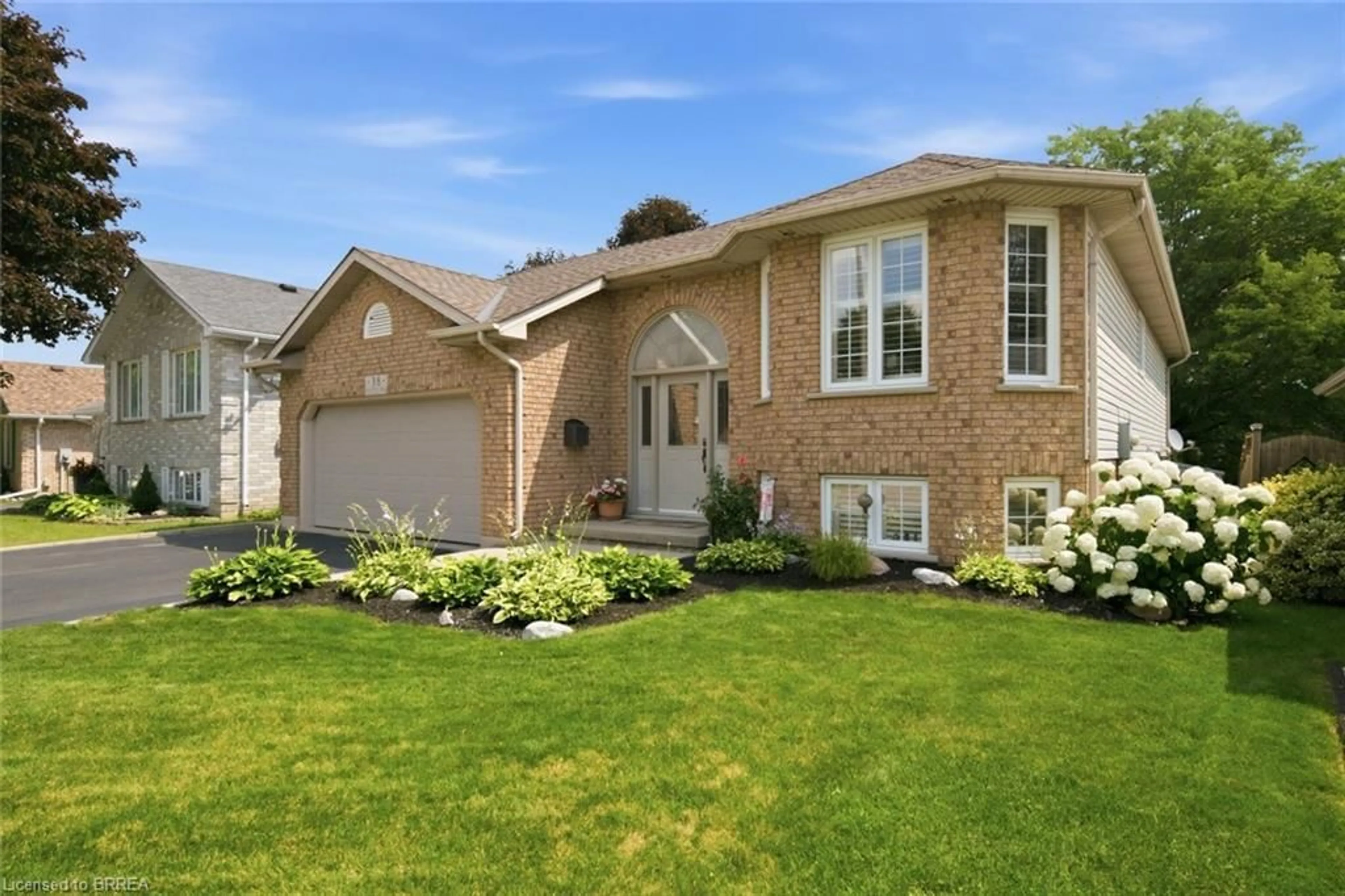 Home with brick exterior material, street for 38 Olivetree Rd, Brantford Ontario N3R 7X2