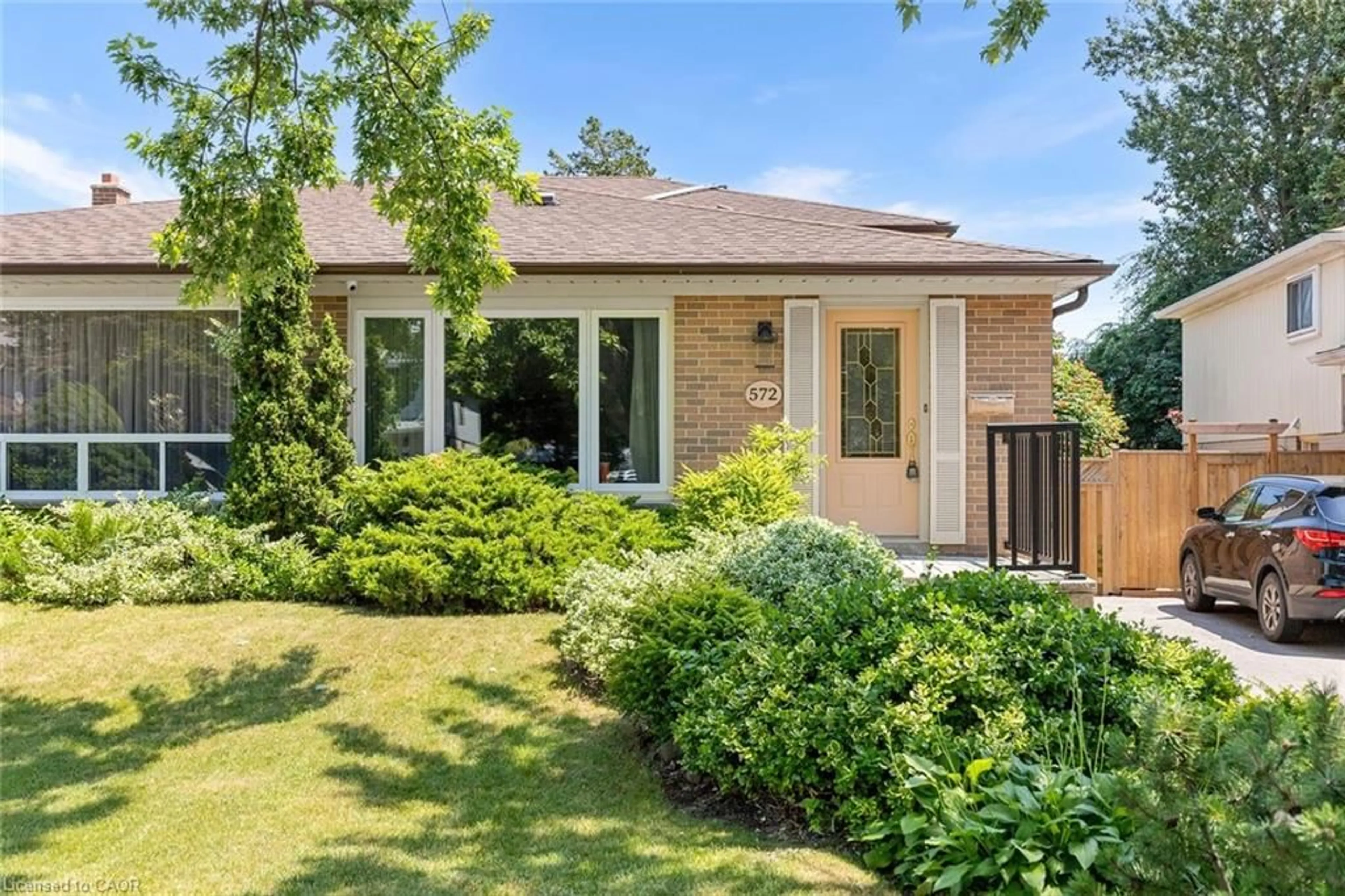 Home with brick exterior material, street for 572 Tedwyn Dr, Mississauga Ontario L5A 1J9