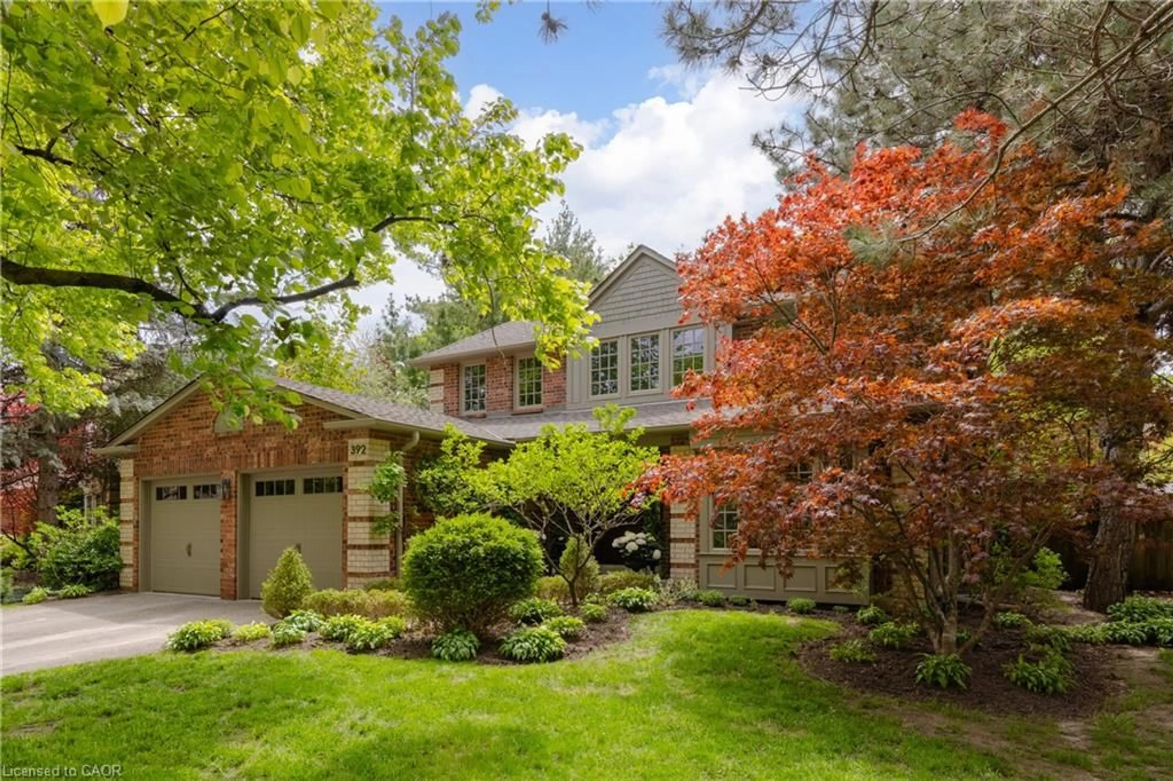Home with brick exterior material, street for 392 Aspen Forest Dr, Oakville Ontario L6J 6H5