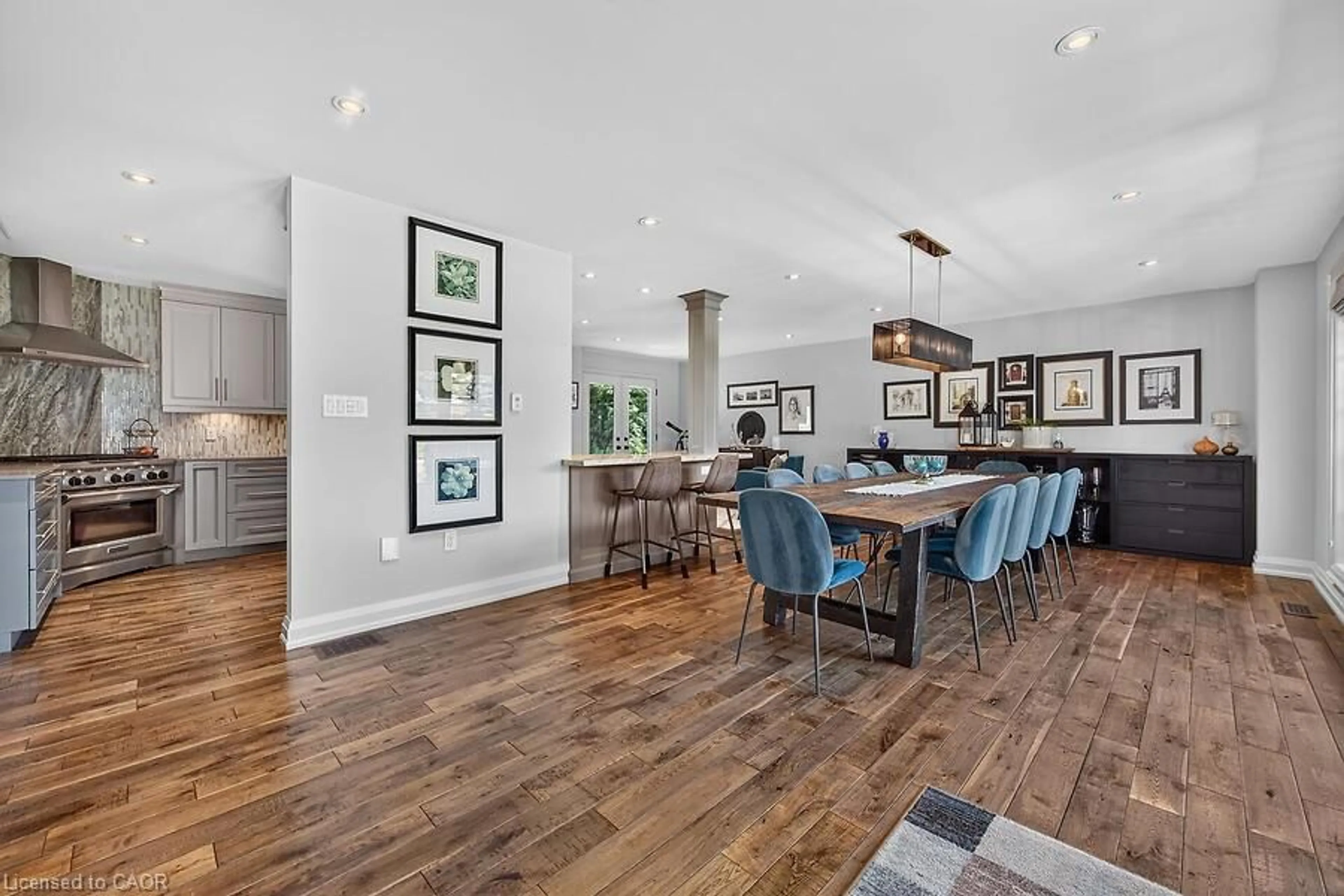 Open concept kitchen, wood/laminate floor for 26 Freeland Crt, Hamilton Ontario L8S 3R5