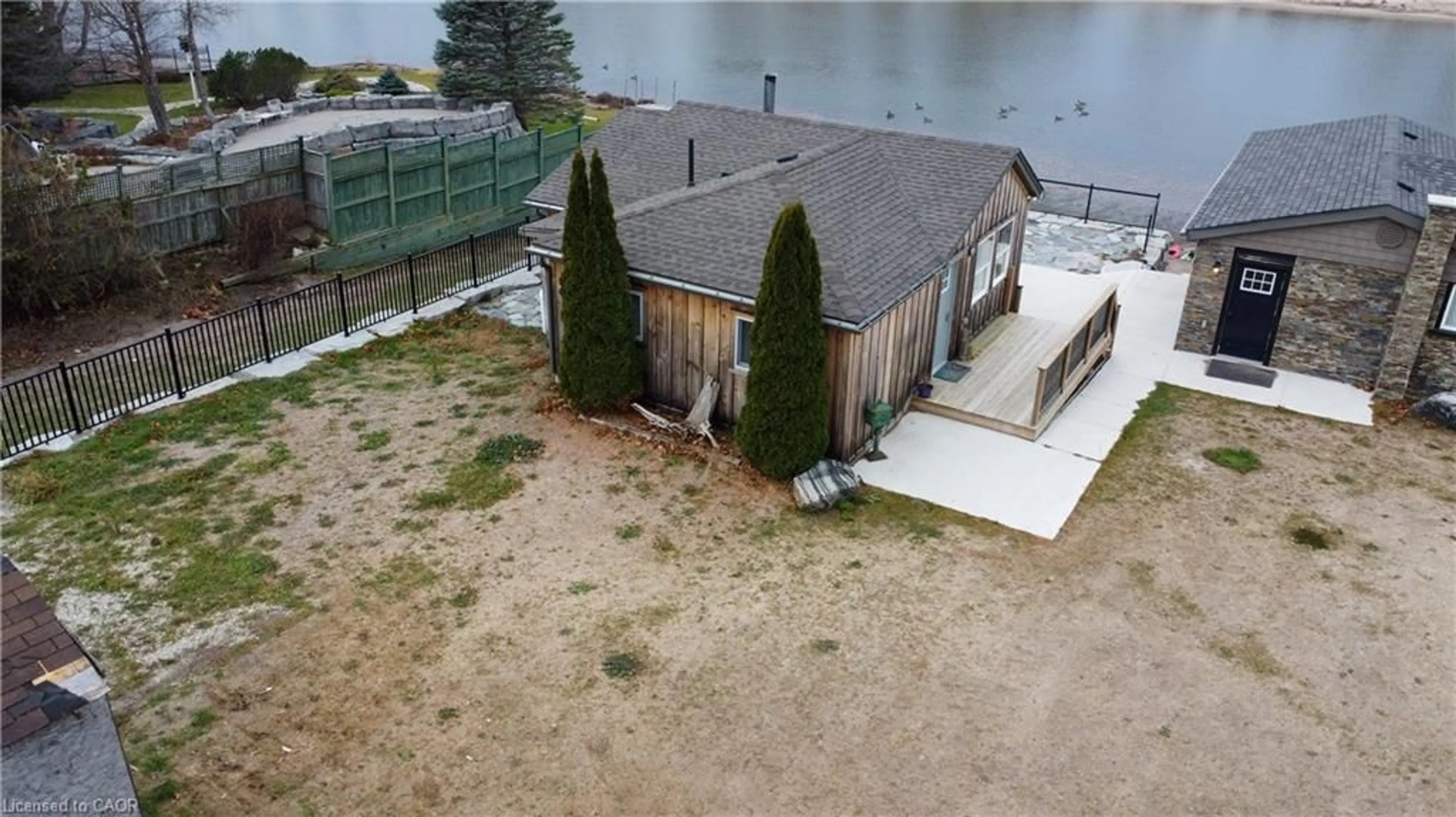 A pic from outside/outdoor area/front of a property/back of a property/a pic from drone, water/lake/river/ocean view for 2 Browns Lane, Wasaga Beach Ontario L9Z 2L7