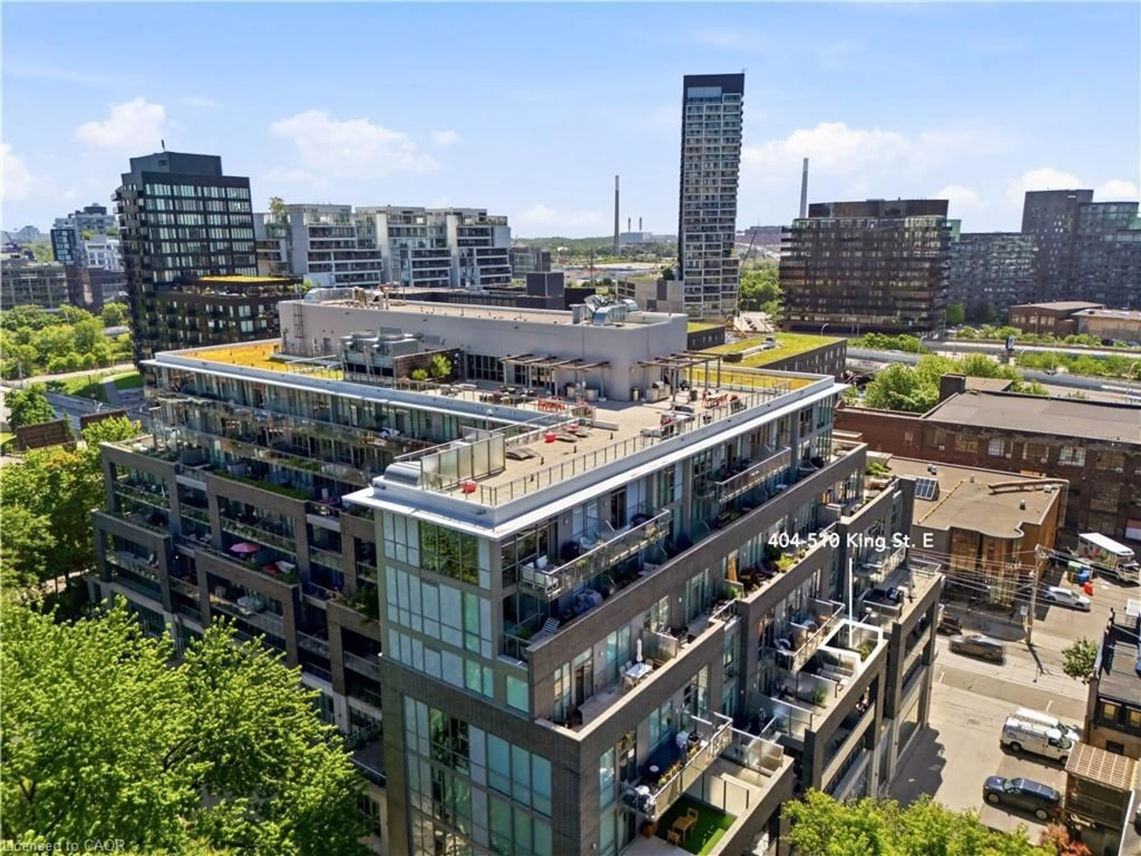A pic from outside/outdoor area/front of a property/back of a property/a pic from drone, city buildings view from balcony for 510 King St #404, Toronto Ontario M5A 0E5