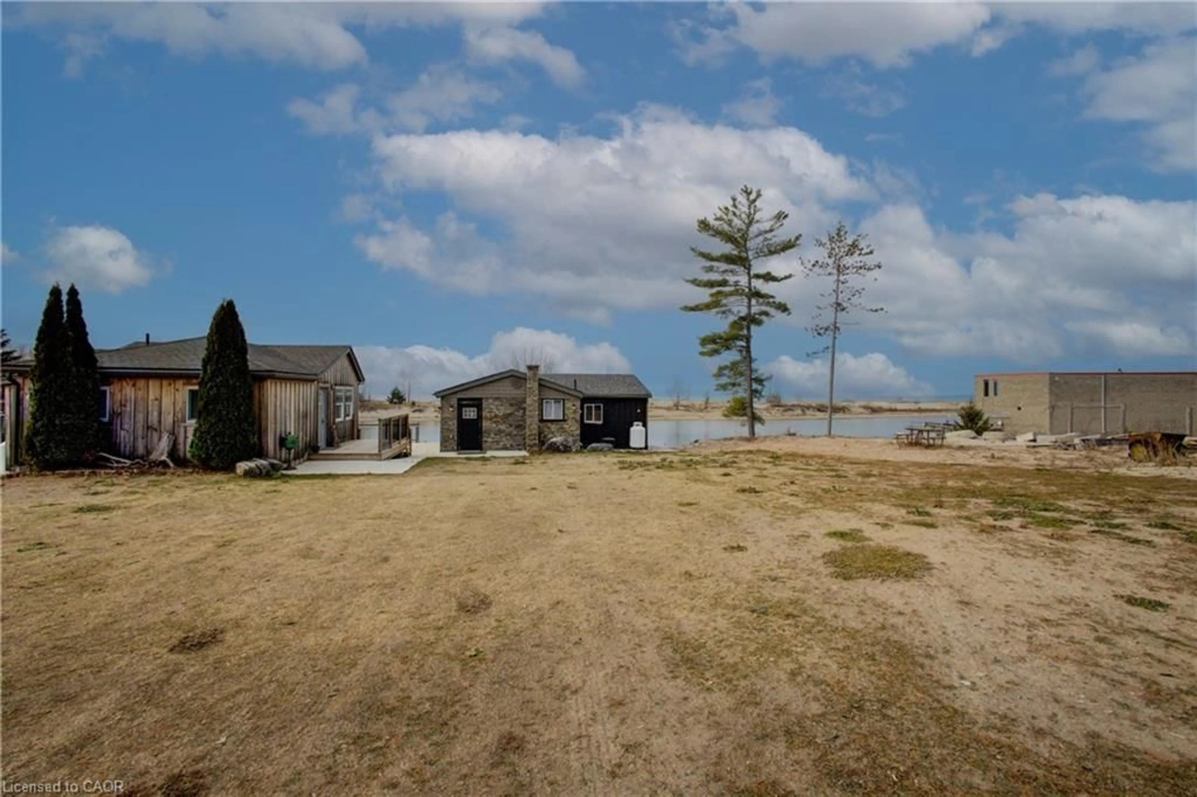 A pic from outside/outdoor area/front of a property/back of a property/a pic from drone, unknown for 4 Browns Lane, Wasaga Beach Ontario L9Z 2L8