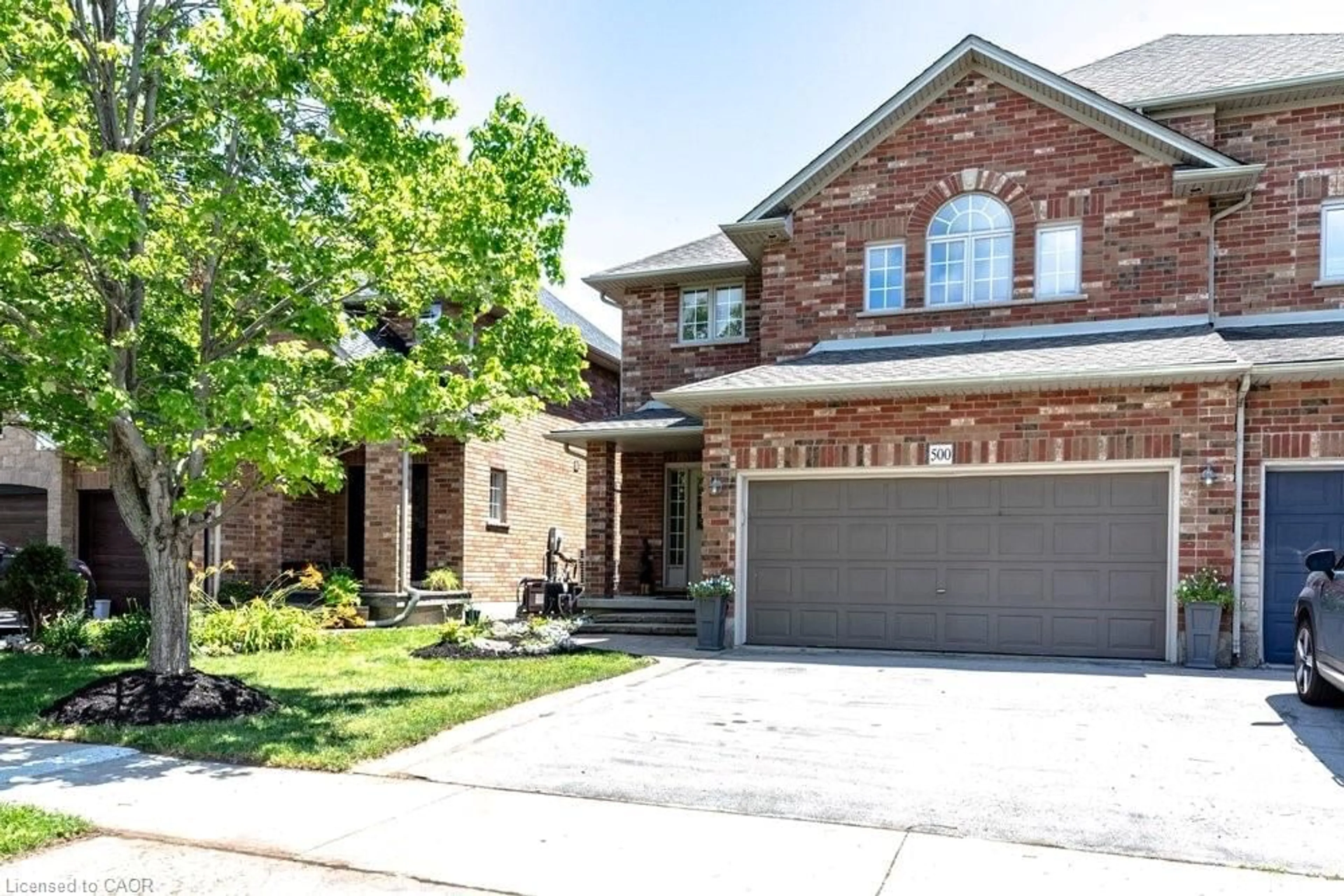 Home with brick exterior material, street for 500 Sandcherry Dr, Burlington Ontario L7T 4L4
