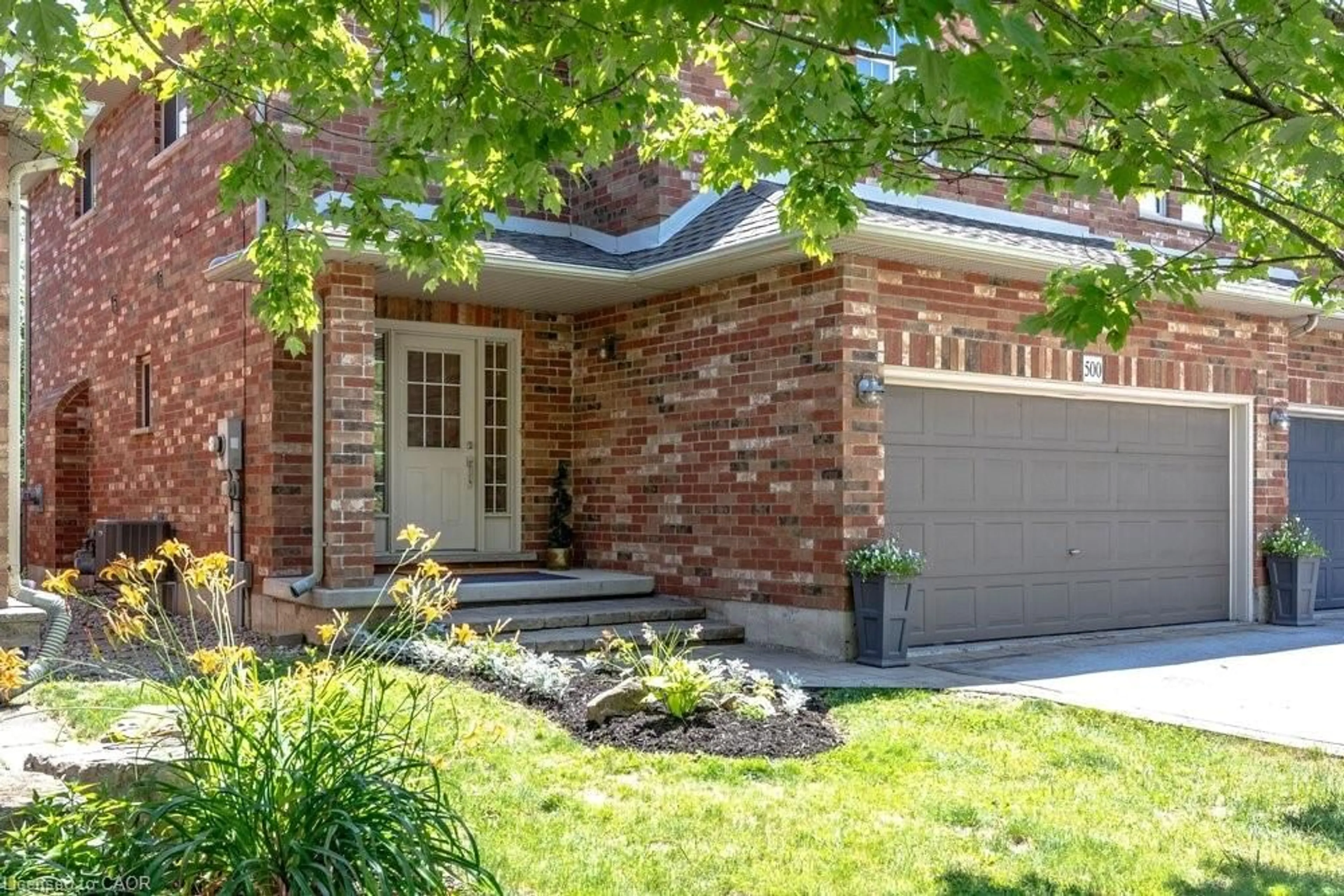 Home with brick exterior material, street for 500 Sandcherry Dr, Burlington Ontario L7T 4L4