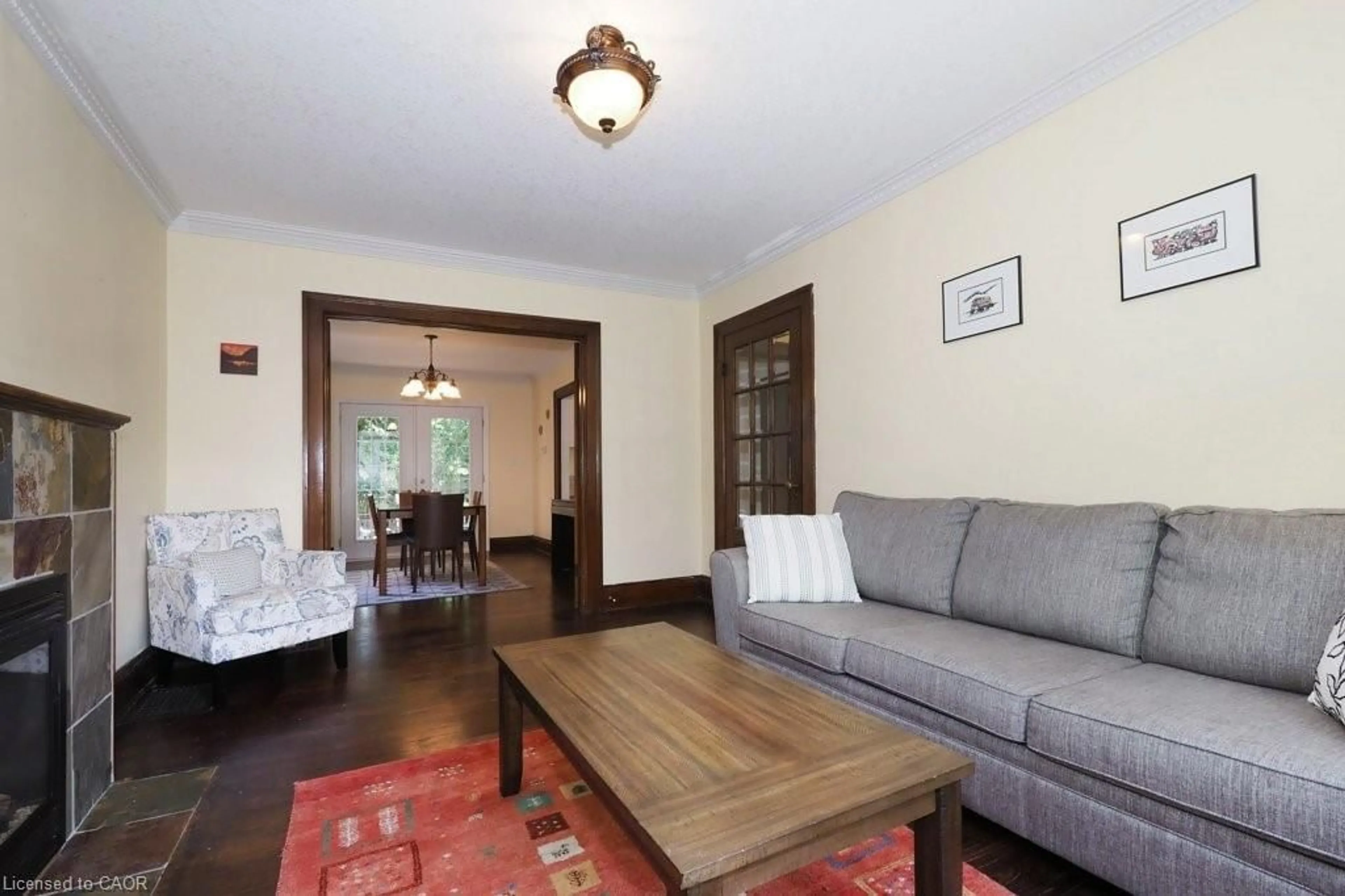 Living room with furniture, wood/laminate floor for 223 Wellington St, Kitchener Ontario N2H 5K6