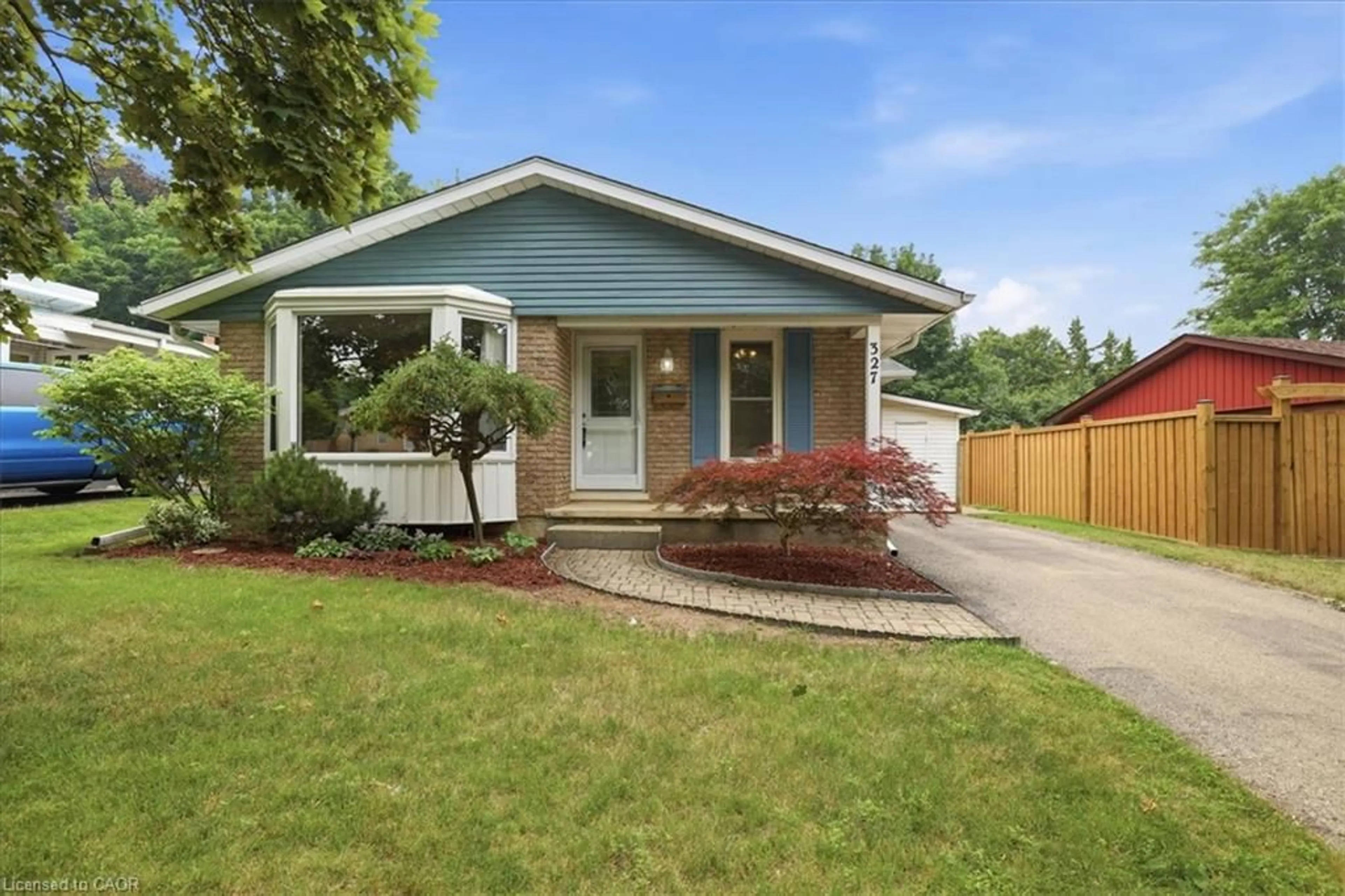 Home with vinyl exterior material, street for 327 Grangewood Dr, Waterloo Ontario N2K 2E4