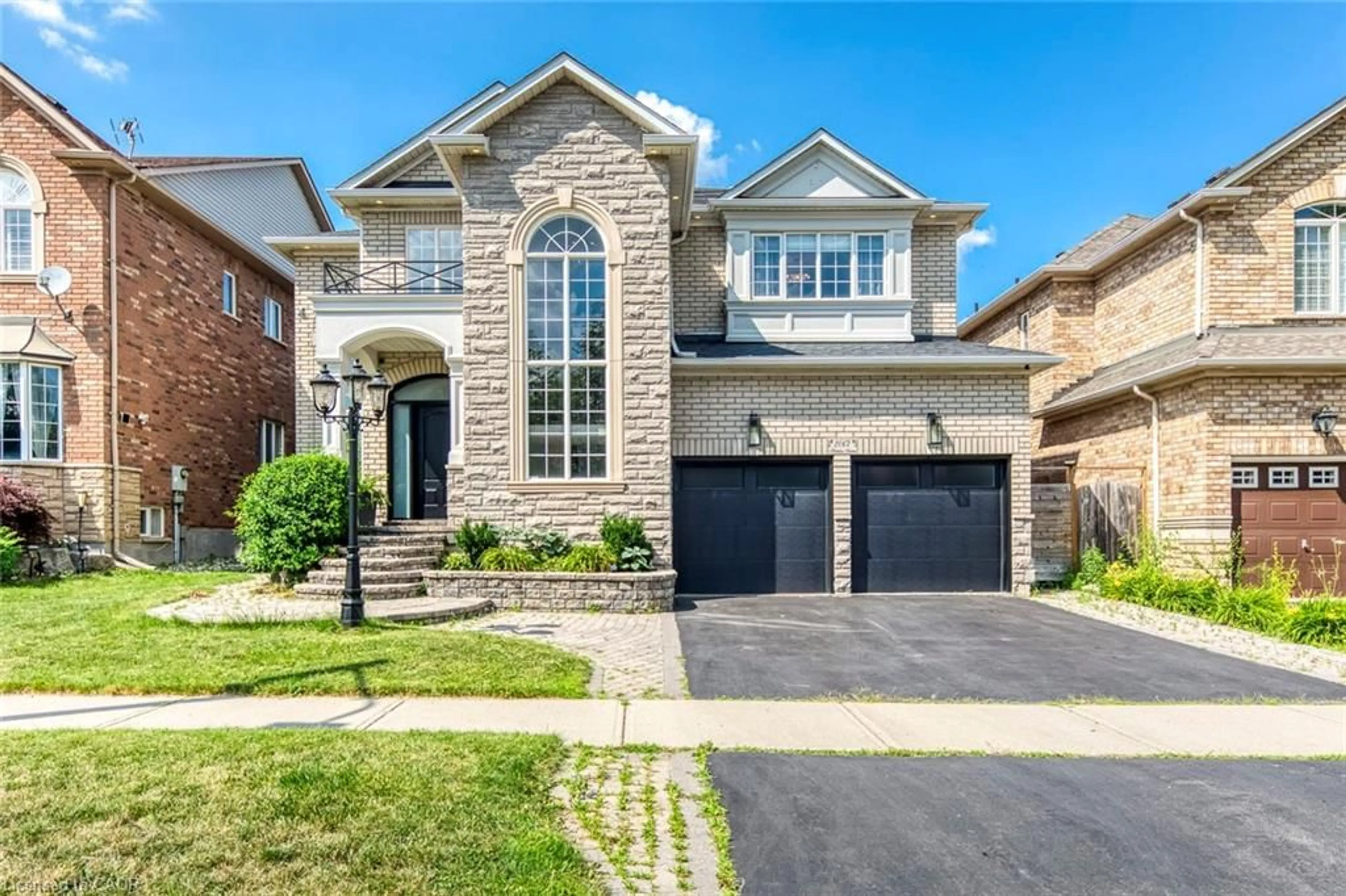 Home with brick exterior material, street for 2067 Helmsley Ave, Oakville Ontario L6M 4R5