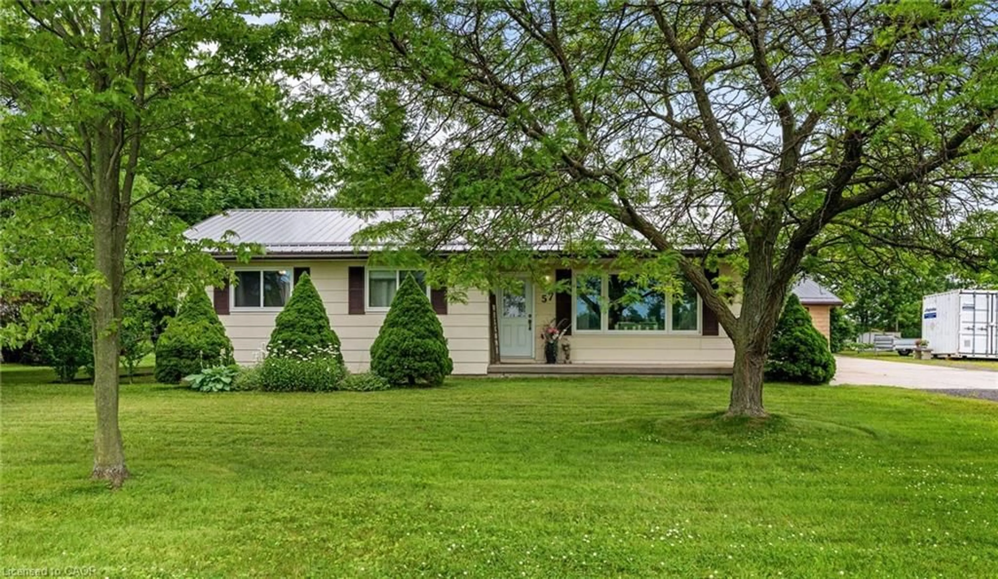 Home with vinyl exterior material, street for 57 Talbot St, Jarvis Ontario N0A 1J0