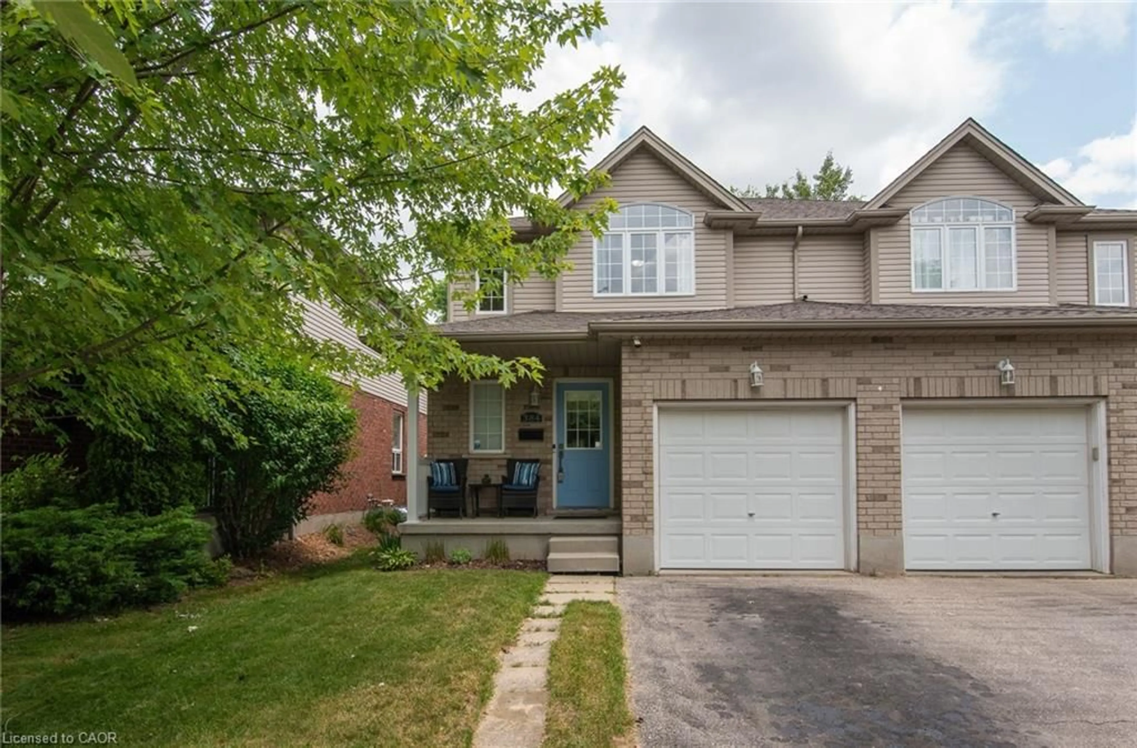 Home with brick exterior material, street for 384 Pastern Trail, Waterloo Ontario N2K 4K7