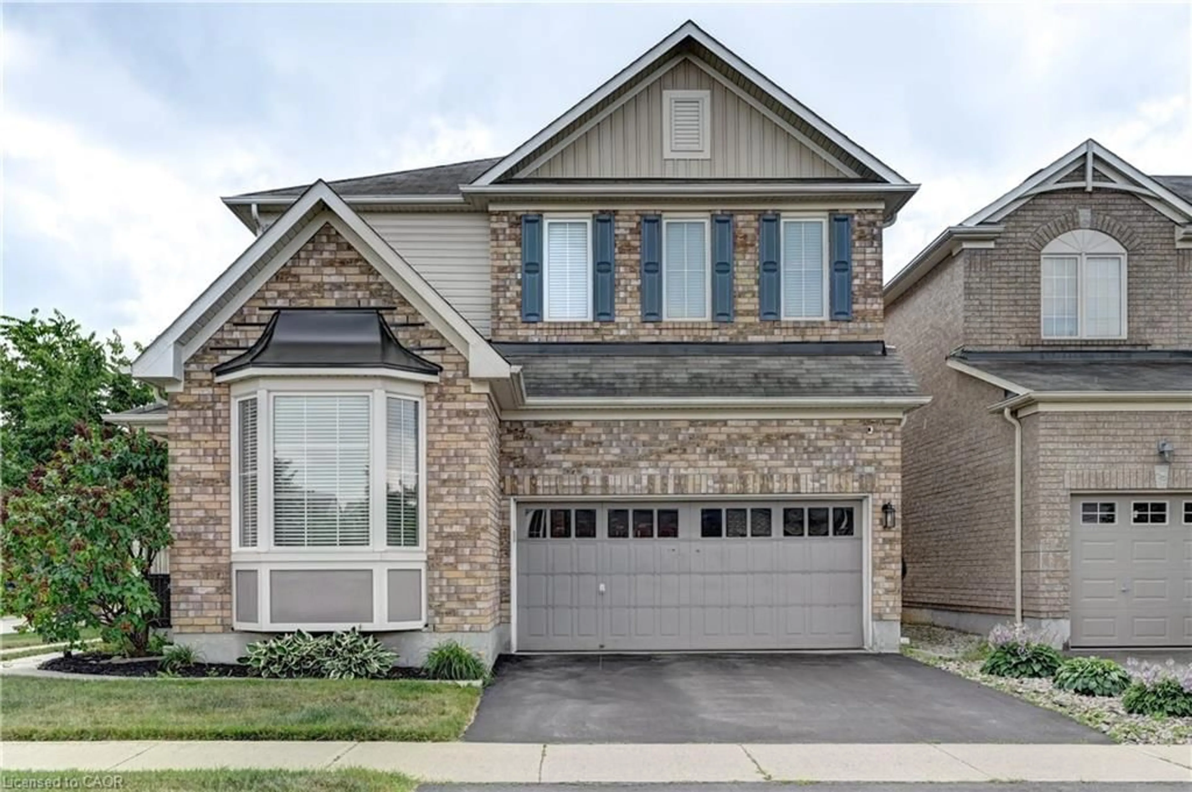 Home with brick exterior material, street for 147 Silverthorne Dr, Cambridge Ontario N3C 0C9