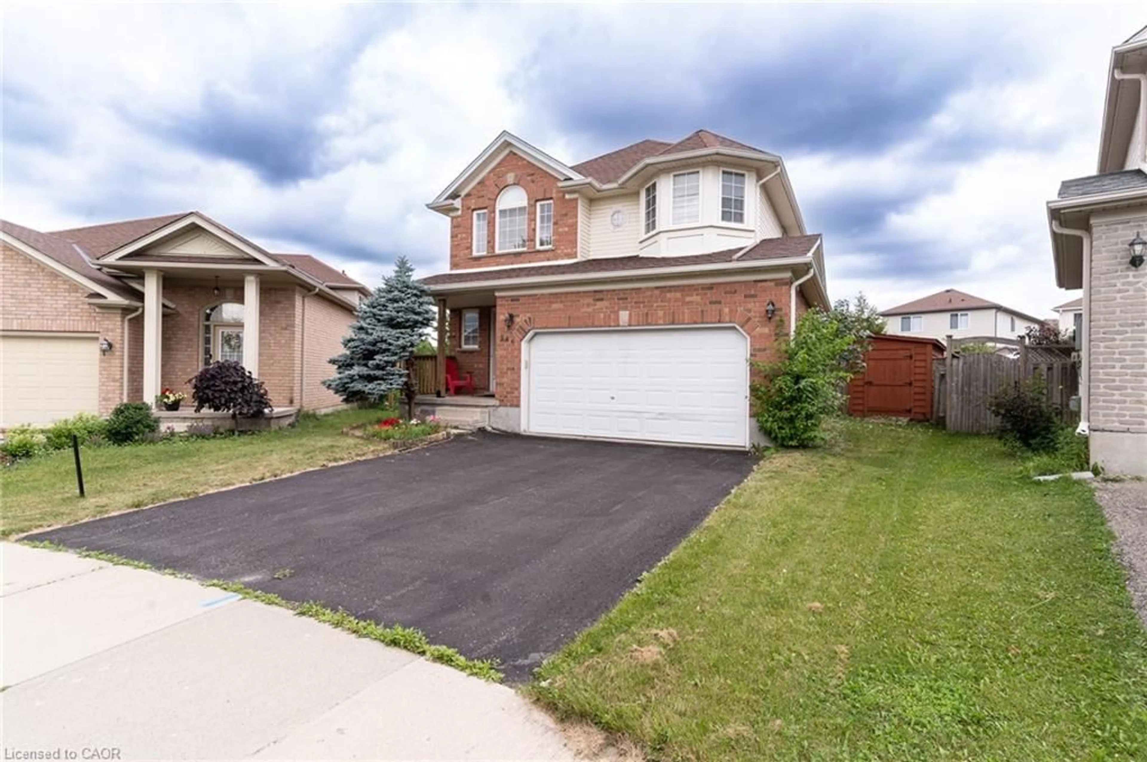 Home with brick exterior material, street for 566 Avignon Pl, Waterloo Ontario N2T 2X5