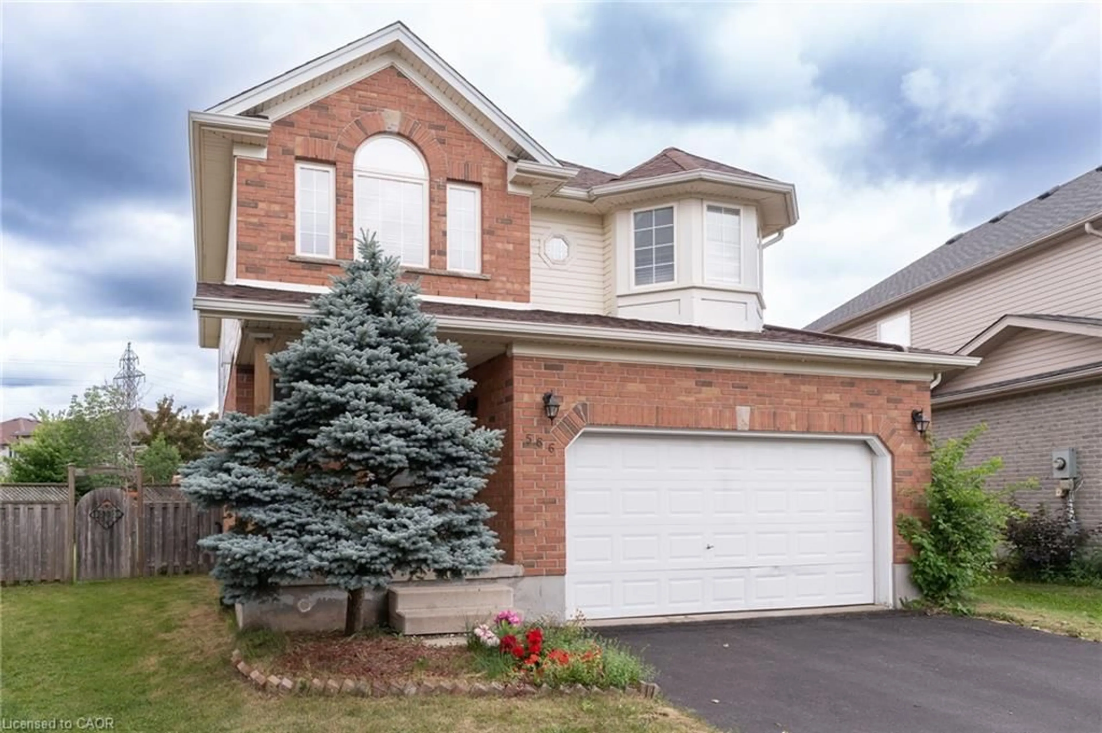 Home with brick exterior material, street for 566 Avignon Pl, Waterloo Ontario N2T 2X5