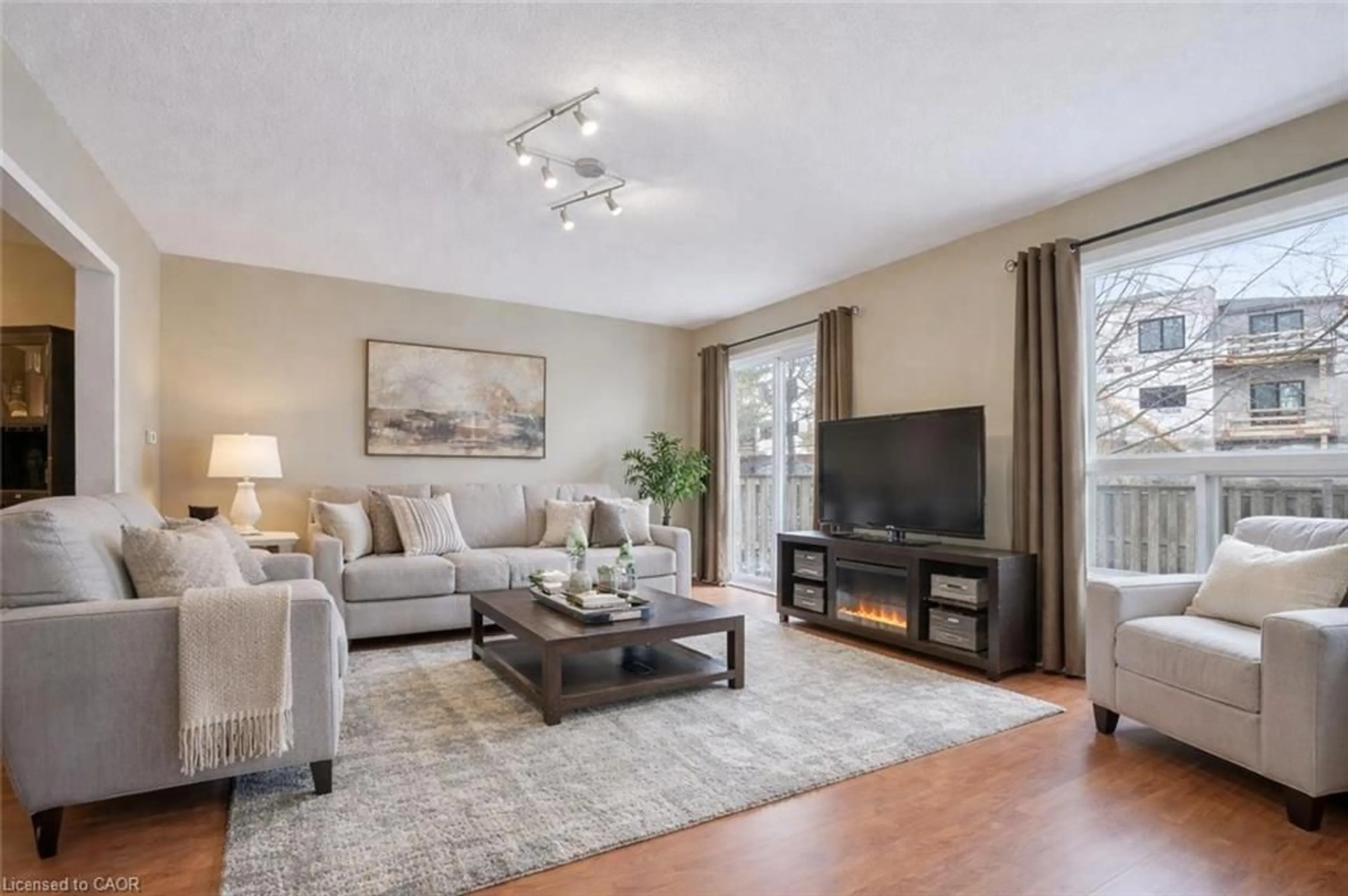 Living room with furniture, unknown for 210 Dawn Ave #38, Guelph Ontario N1G 5L5