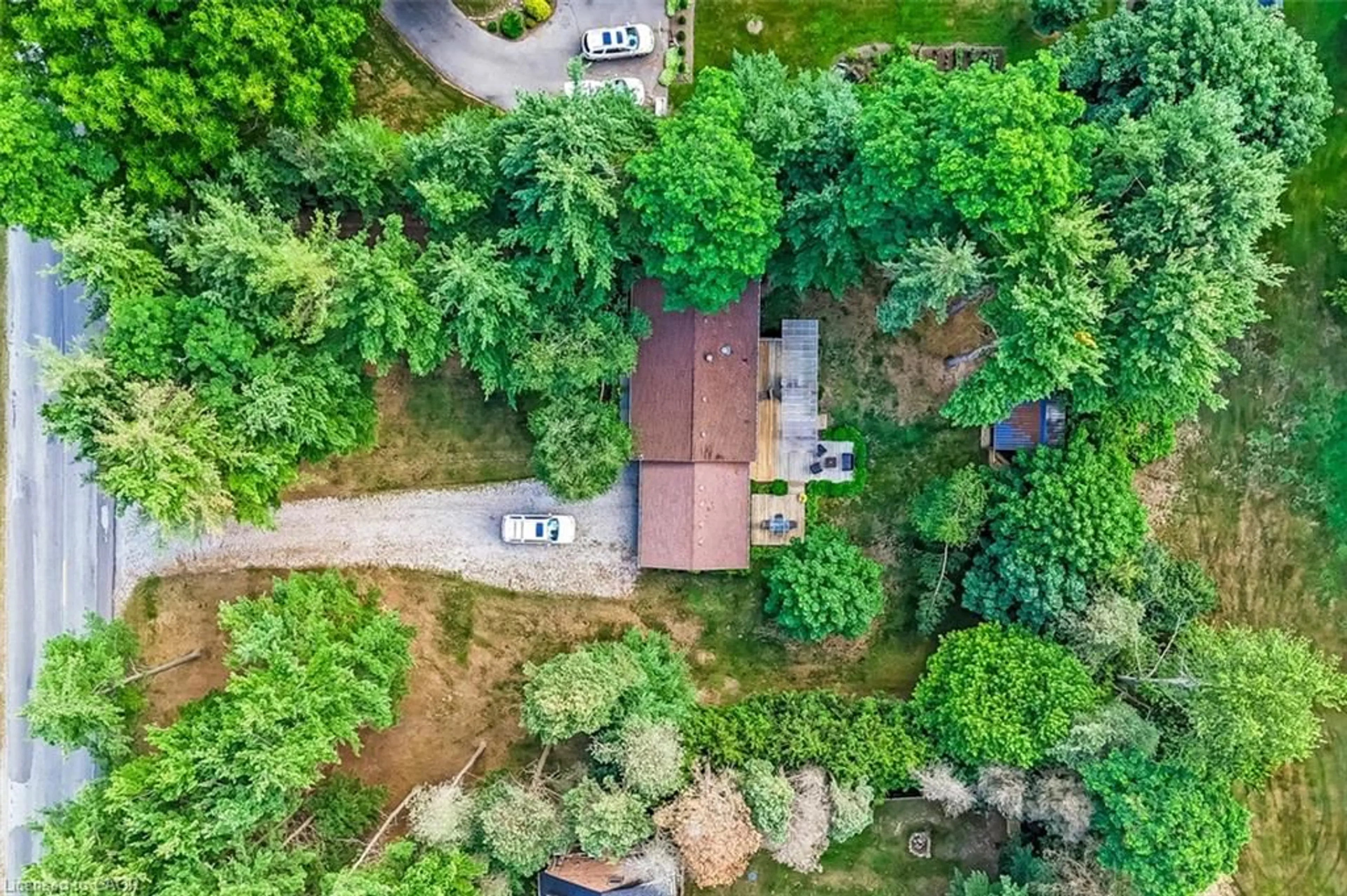 A pic from outside/outdoor area/front of a property/back of a property/a pic from drone, forest/trees view for 1040 Vittoria Rd, Vittoria Ontario N3Y 1W0