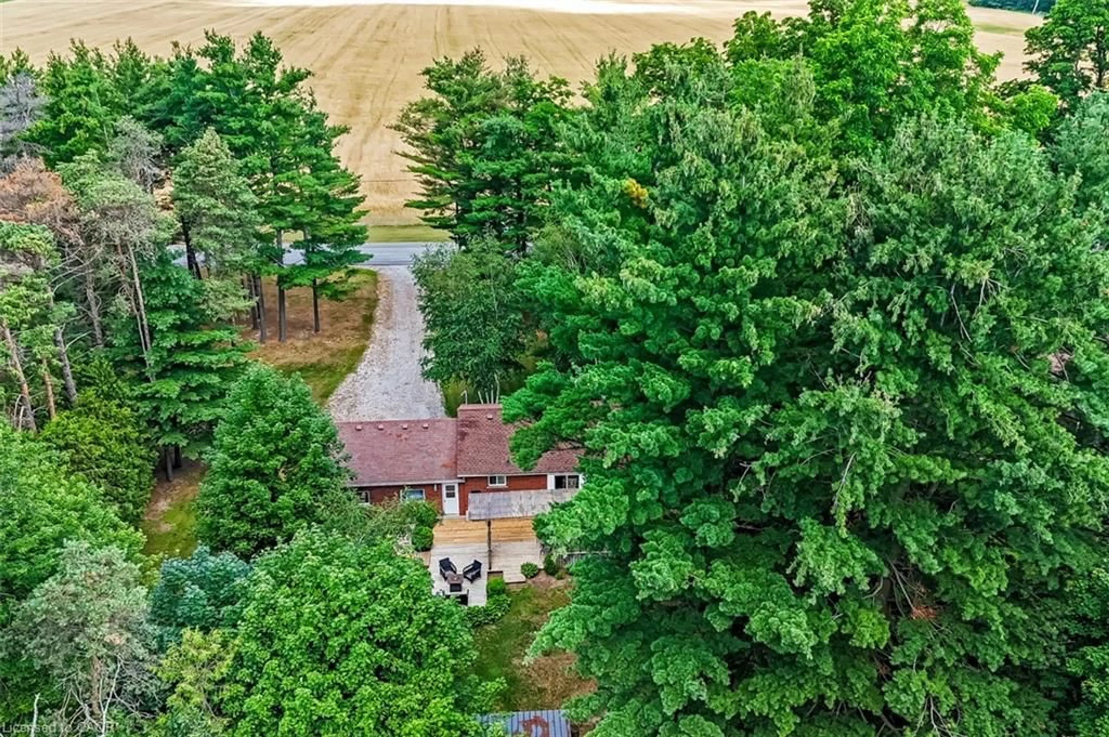A pic from outside/outdoor area/front of a property/back of a property/a pic from drone, forest/trees view for 1040 Vittoria Rd, Vittoria Ontario N3Y 1W0