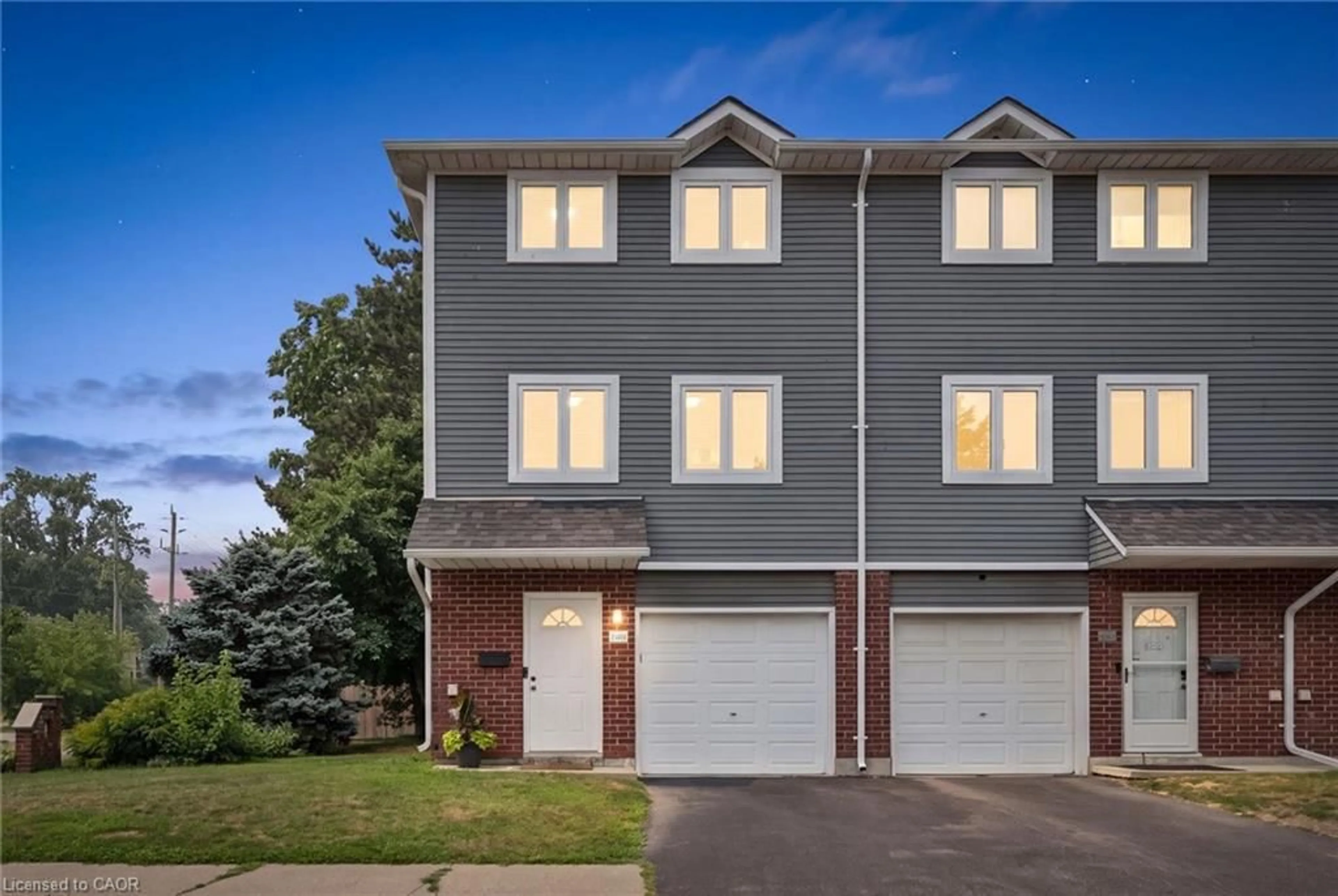 Home with vinyl exterior material, street for 38 Harris Ave #A, Brantford Ontario N3R 2E9